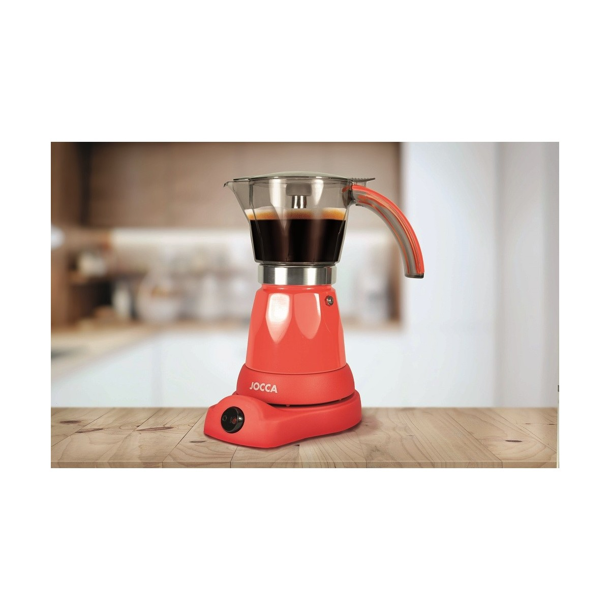 Caffettiera elettrica rossa su tavolo di legno, sfondo cucina.