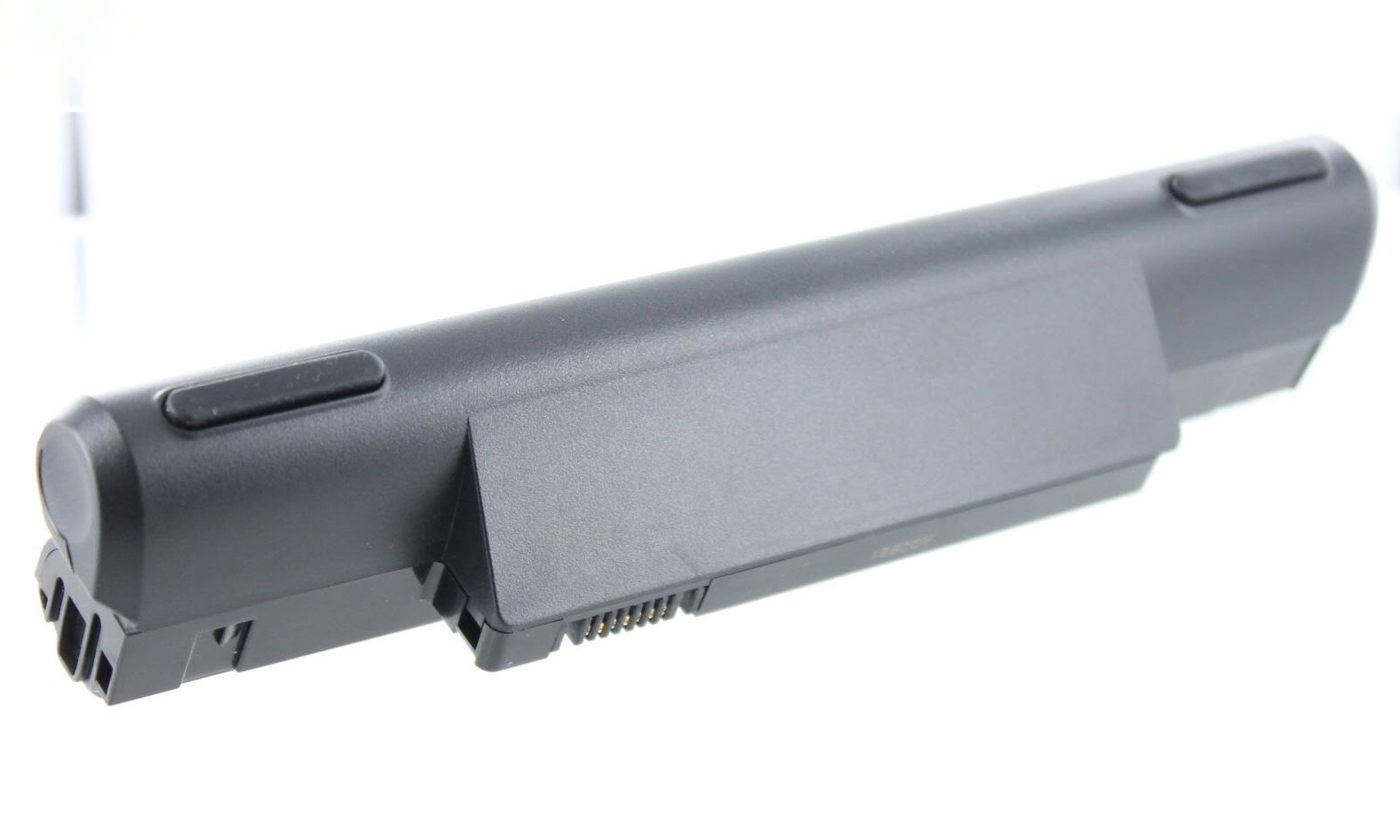 Schwarzer Laptop-Akku. Rechteckige Form, mit zwei schwarzen Knöpfen oben.