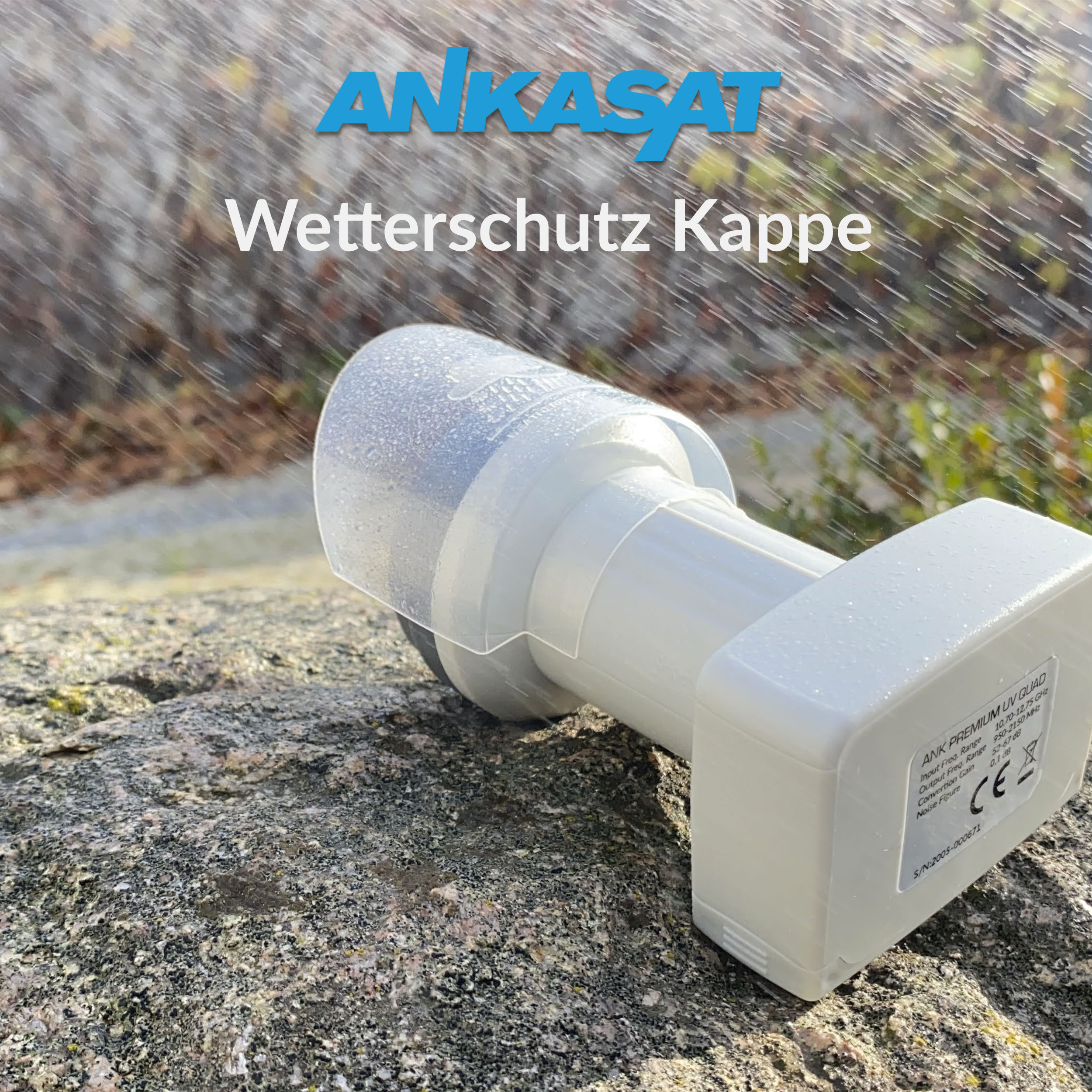 Weißer Satellitenempfänger auf Stein im Regen, mit ANKASAT-Logo und Text.