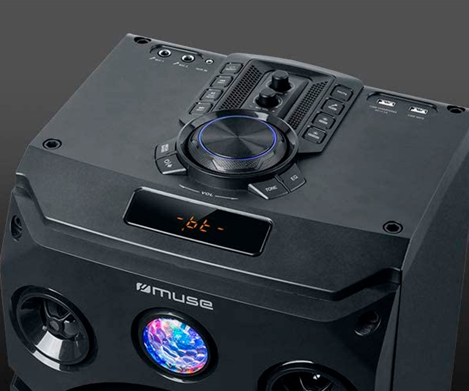 Altoparlante nero con pannello di controllo, pulsanti e display. Effetto palla da discoteca visibile.