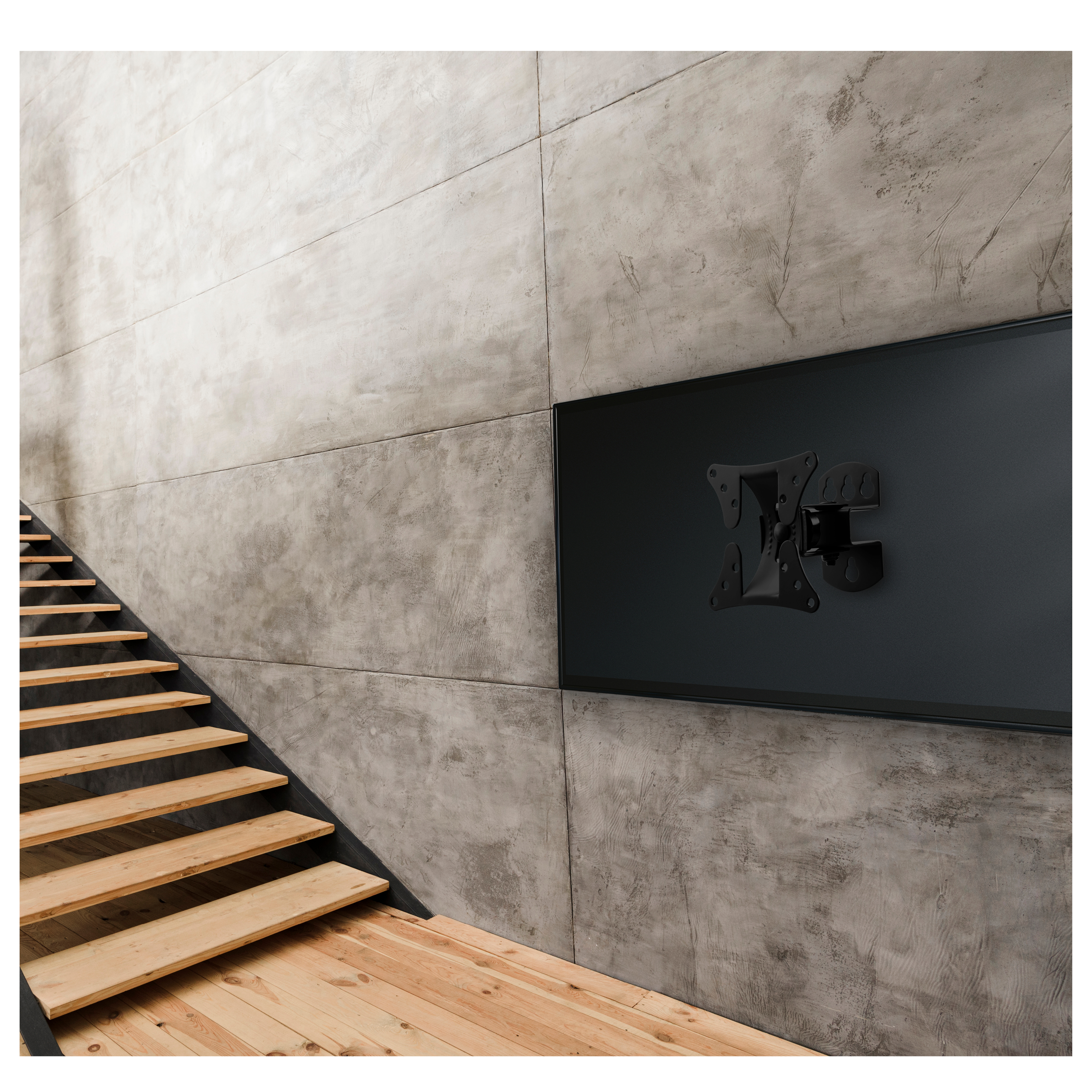 Un televisor negro montado en una pared de concreto gris, con escalones de madera a la izquierda.