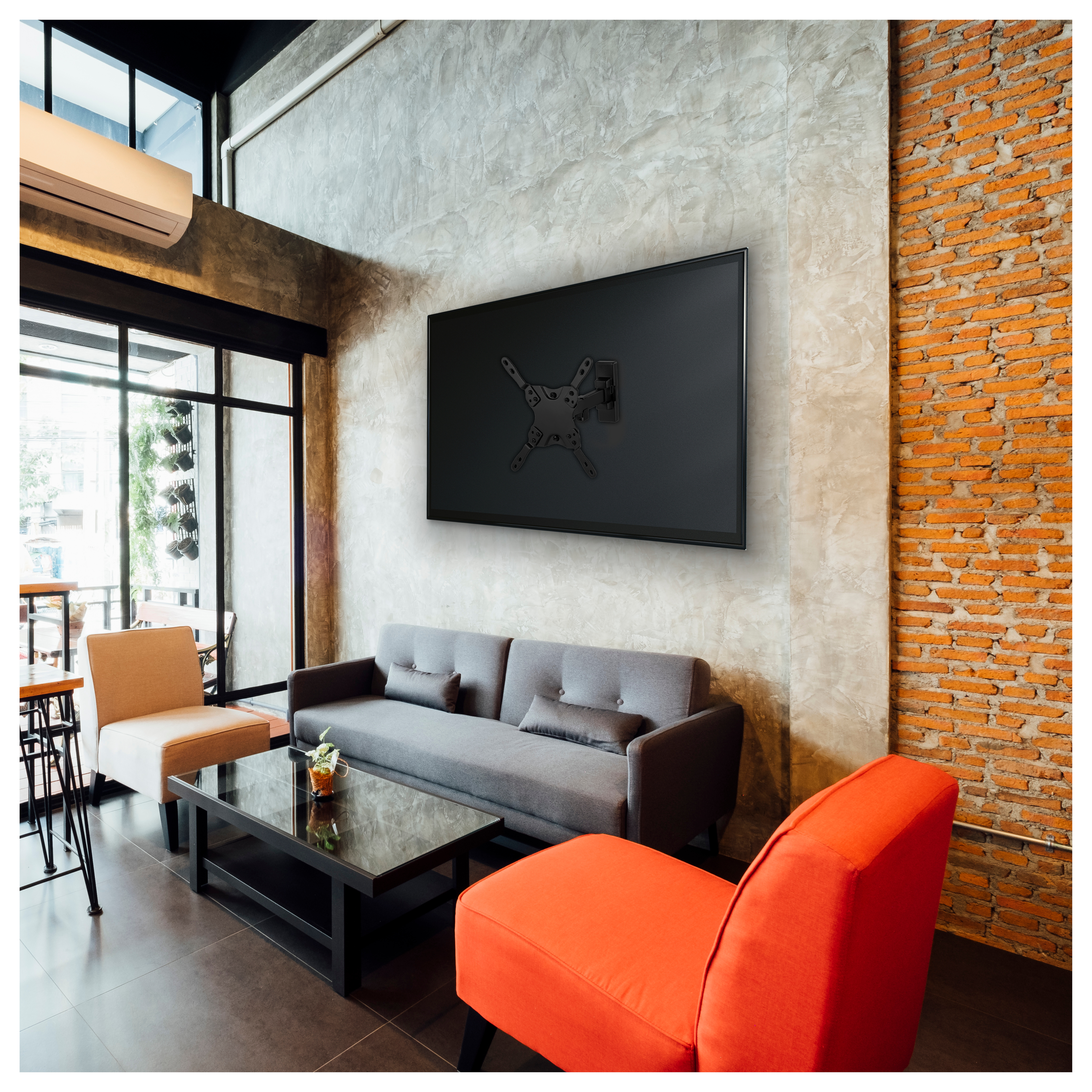 TV montada en pared en sala moderna con muebles.