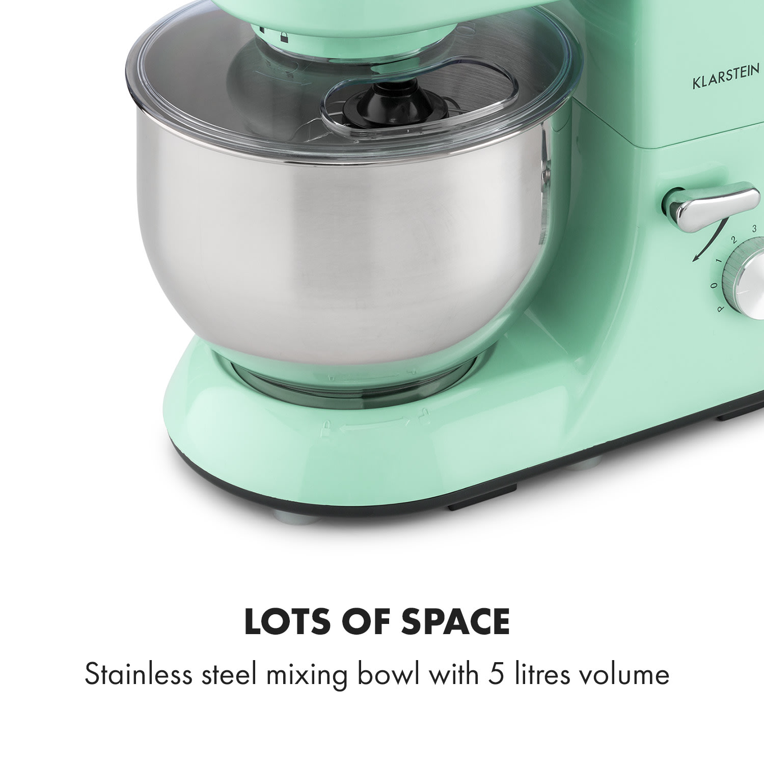 Un robot da cucina verde menta con una ciotola in acciaio inox.