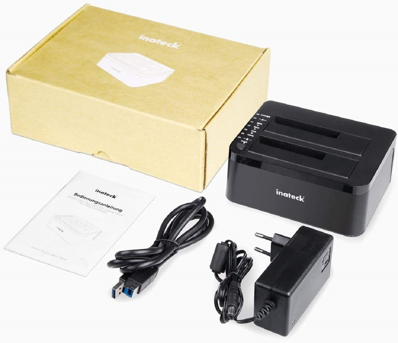 Festplatten-Dockingstation mit Zubehör: Box, Netzteil, USB-Kabel und Bedienungsanleitung.
