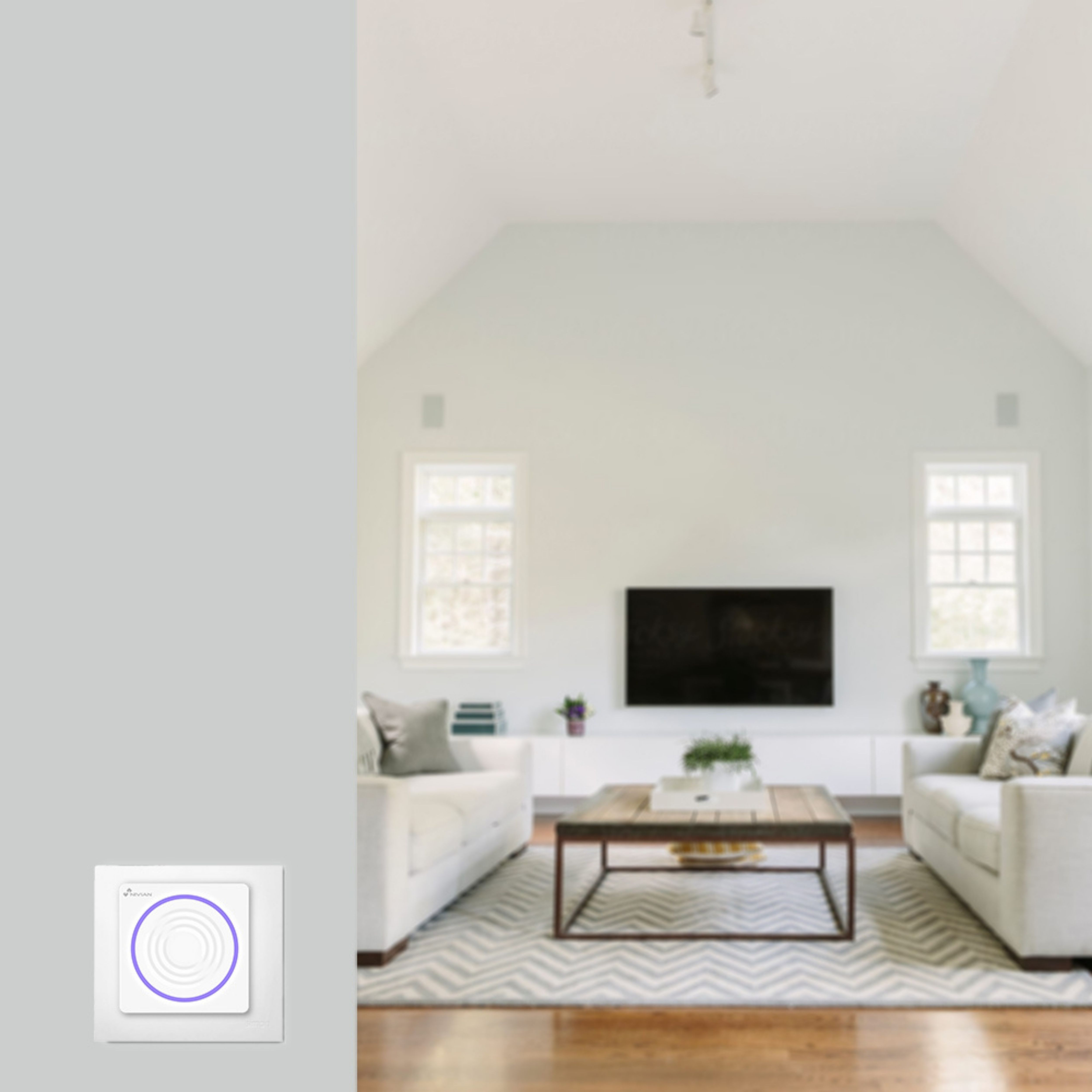 Salón moderno con sofás blancos, una mesa de madera oscura y un televisor de pantalla plana en la pared.