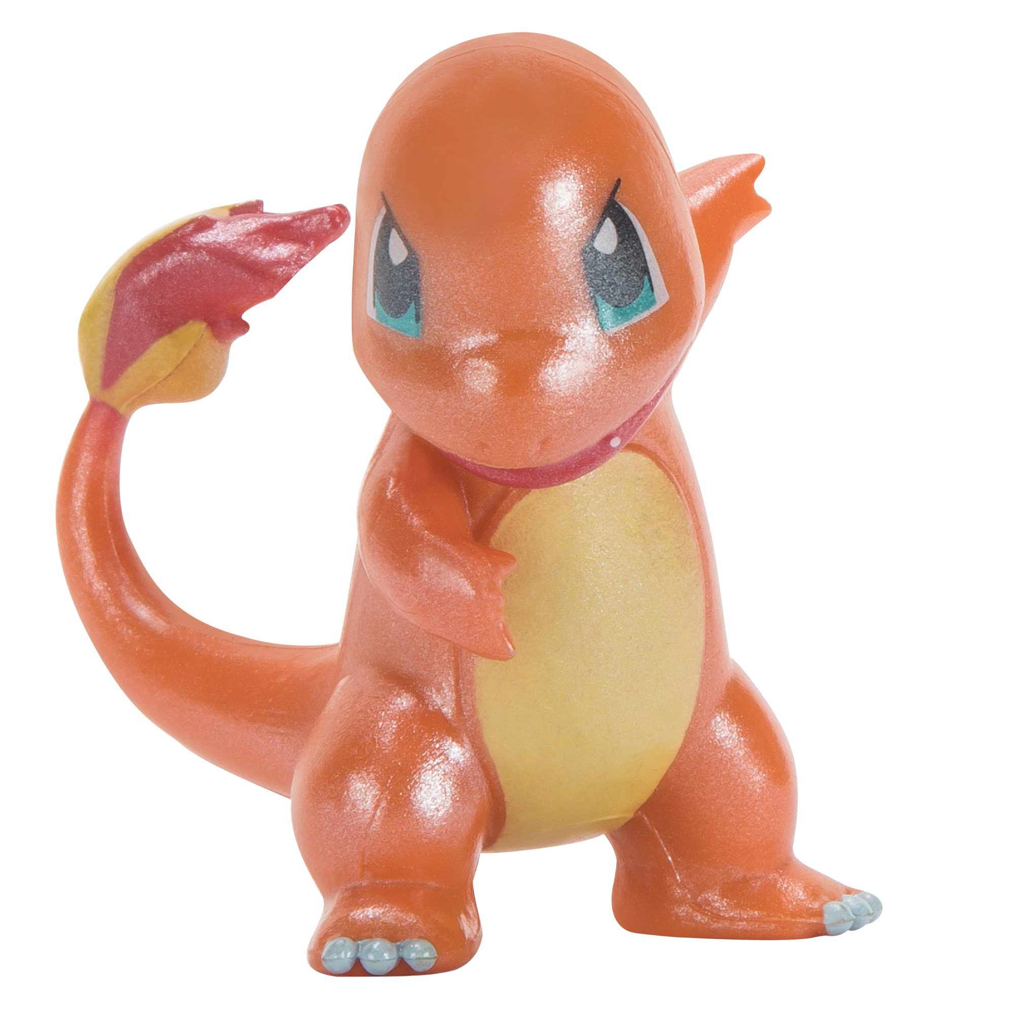 Statuetta di Charmander arancione, in piedi, sfondo bianco.