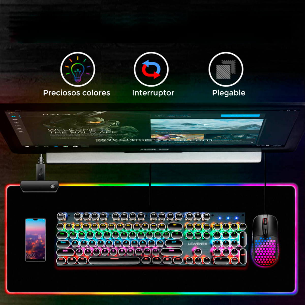 Configuración de juego con teclado, ratón y monitor. El teclado y el ratón tienen luces de colores.