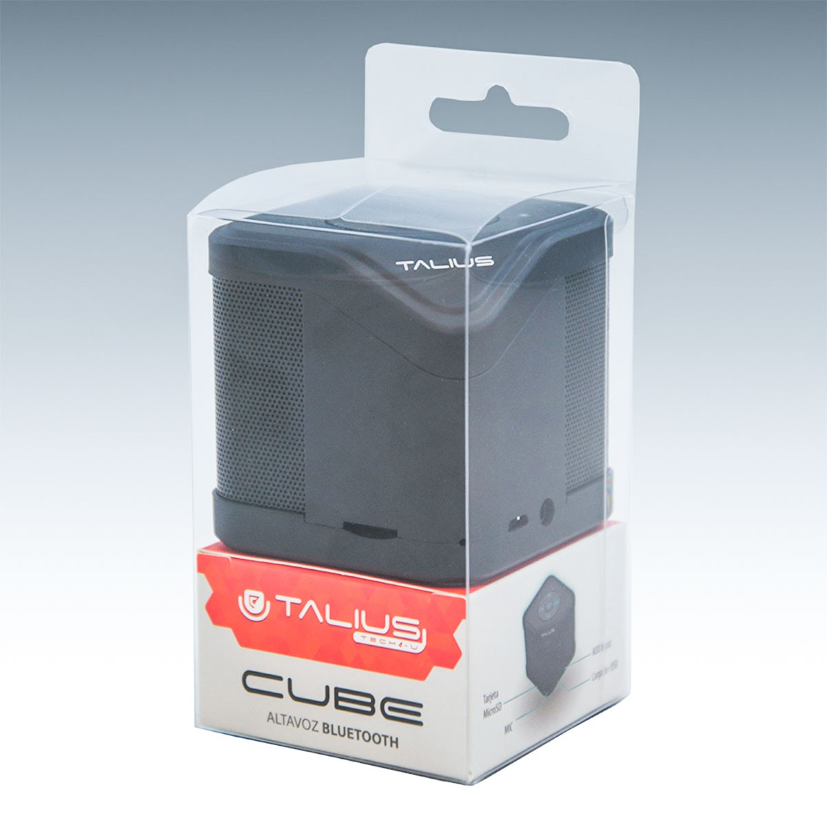 Un altavoz negro en forma de cubo en una caja de plástico transparente, con una base etiquetada en rojo y blanco.