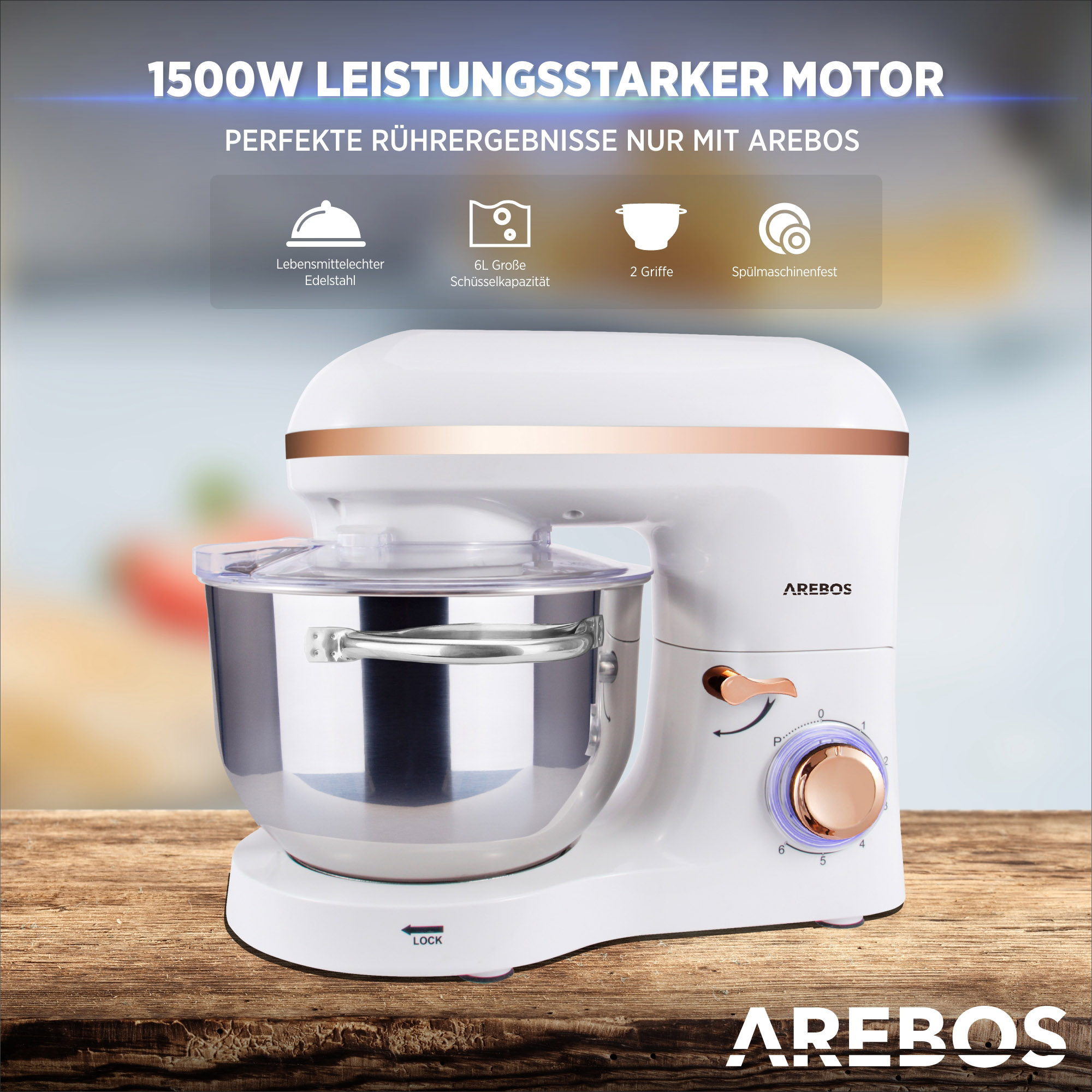 Weißer Küchenmixer mit goldenen Akzenten, einer silbernen Schüssel und Symbolen oben. Hintergrund aus Holz.