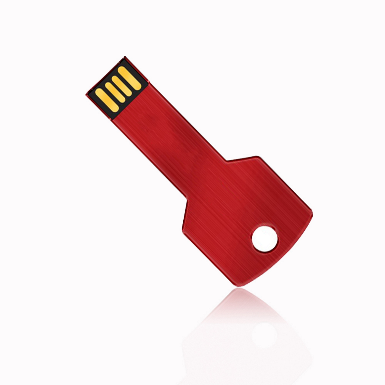 Ein roter USB-Stick in Schlüsselform mit Loch im Griff, auf einer weißen Oberfläche reflektiert.