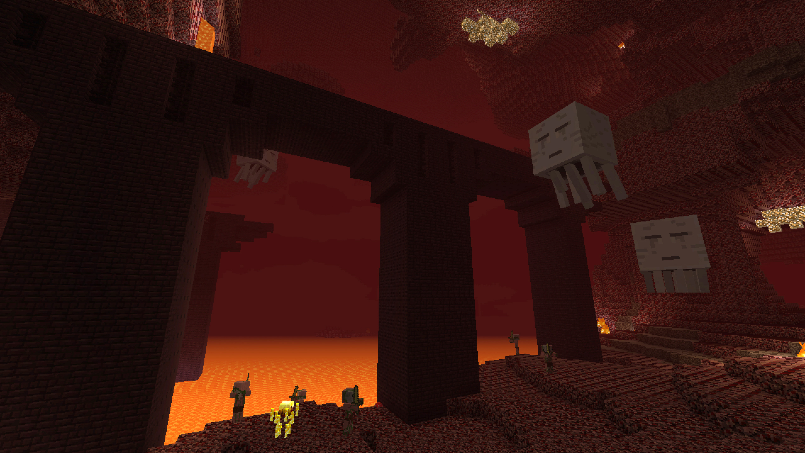 Eine Minecraft-Szene im Nether. Es gibt eine Brücke, Lava und drei schwebende Ghasts.