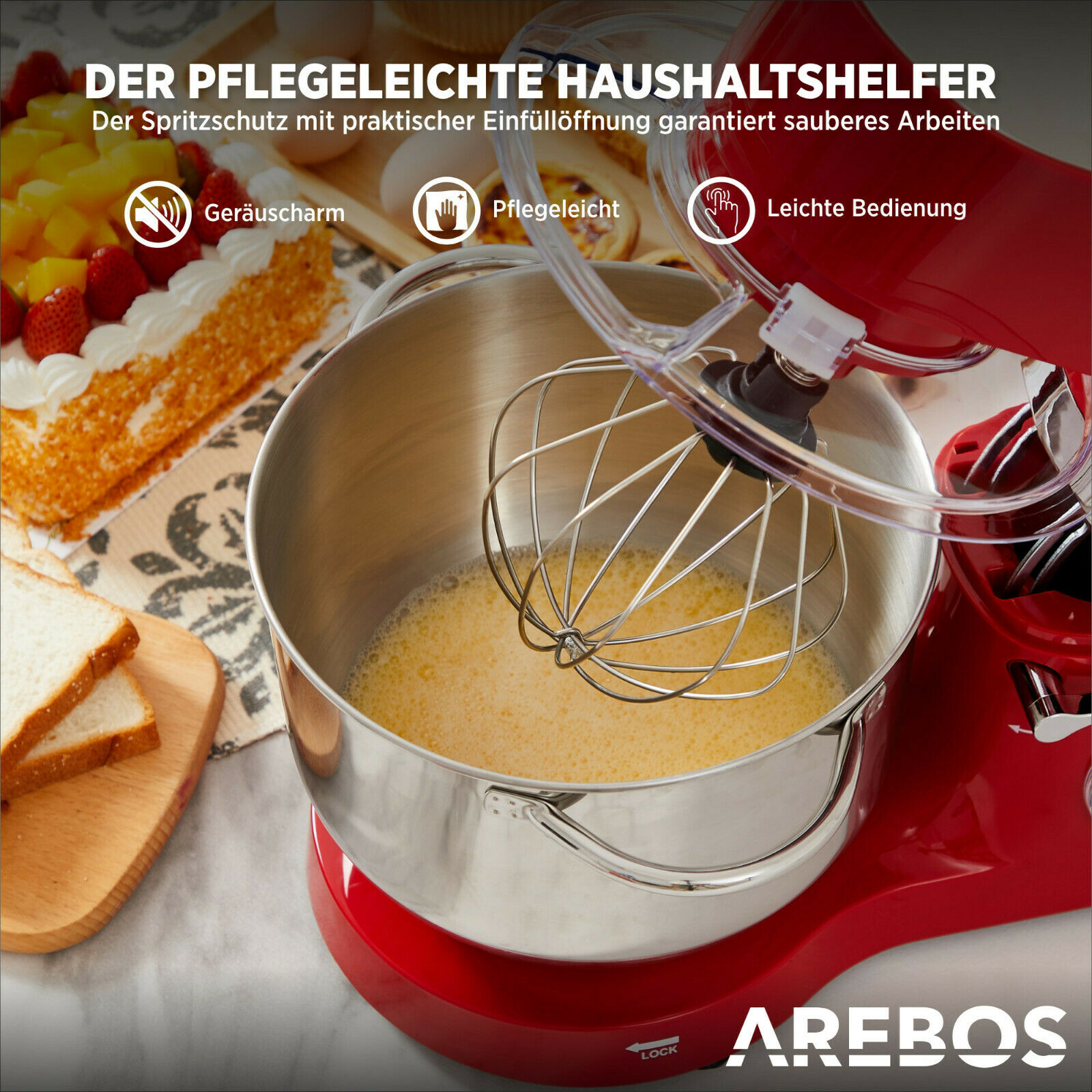 Roter und silberner Küchenmixer mit Zubehör. Der Mixer steht auf weißem Untergrund mit Text.