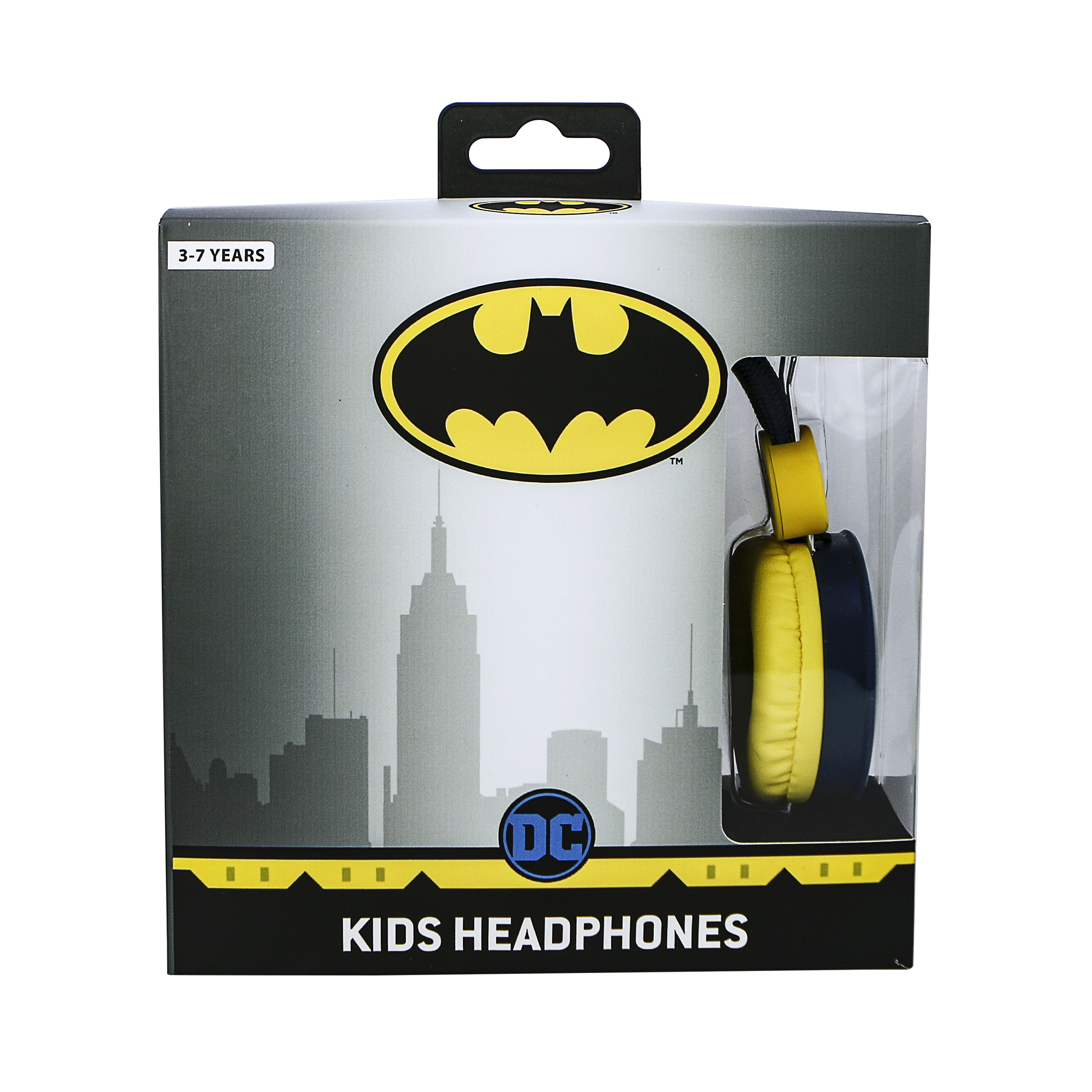 Batman-Kinderkopfhörer in einer Box. Die Kopfhörer sind gelb und blau. Die Box hat eine Skyline.