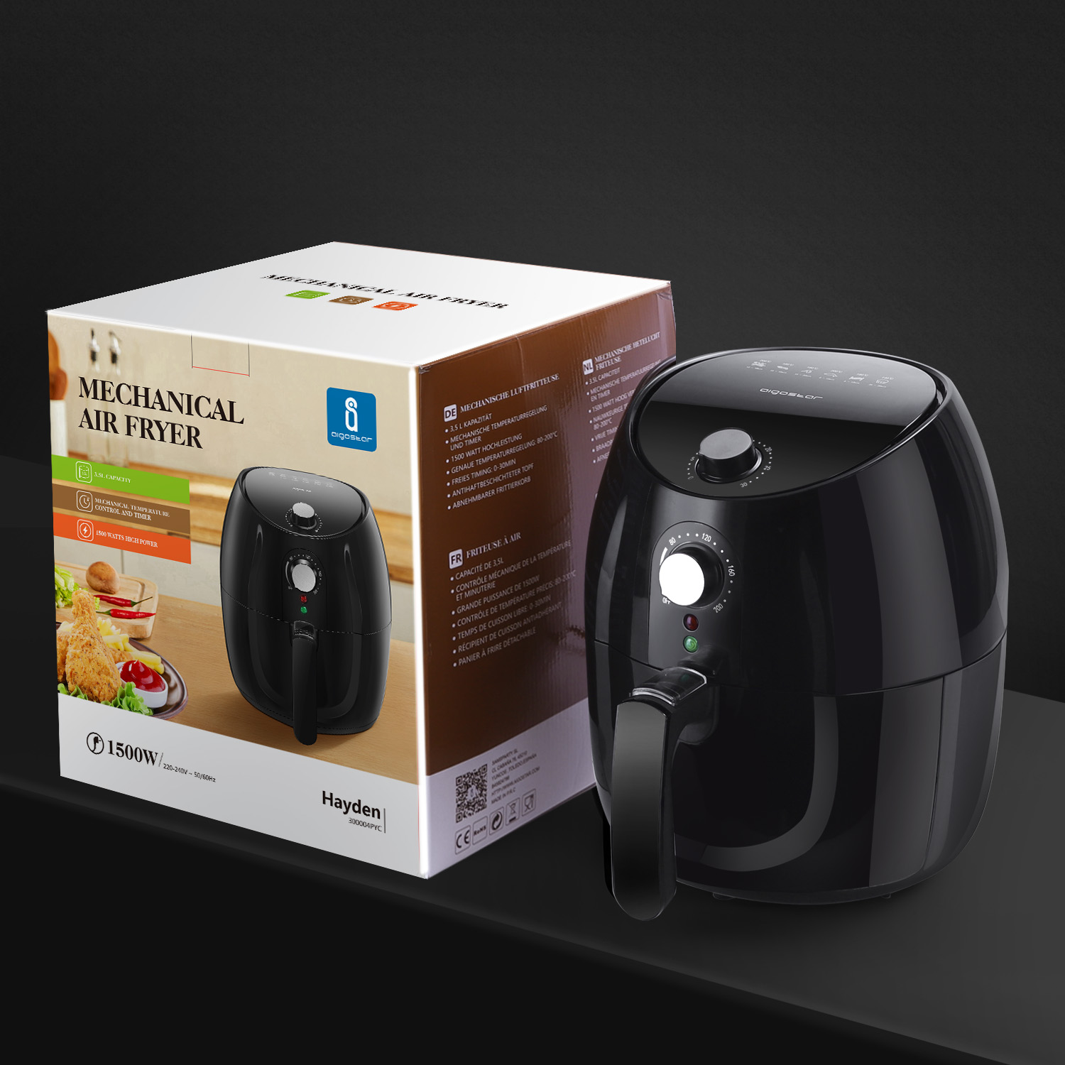 Freidora de aire negra con caja. La caja muestra imágenes de comida y un dial.