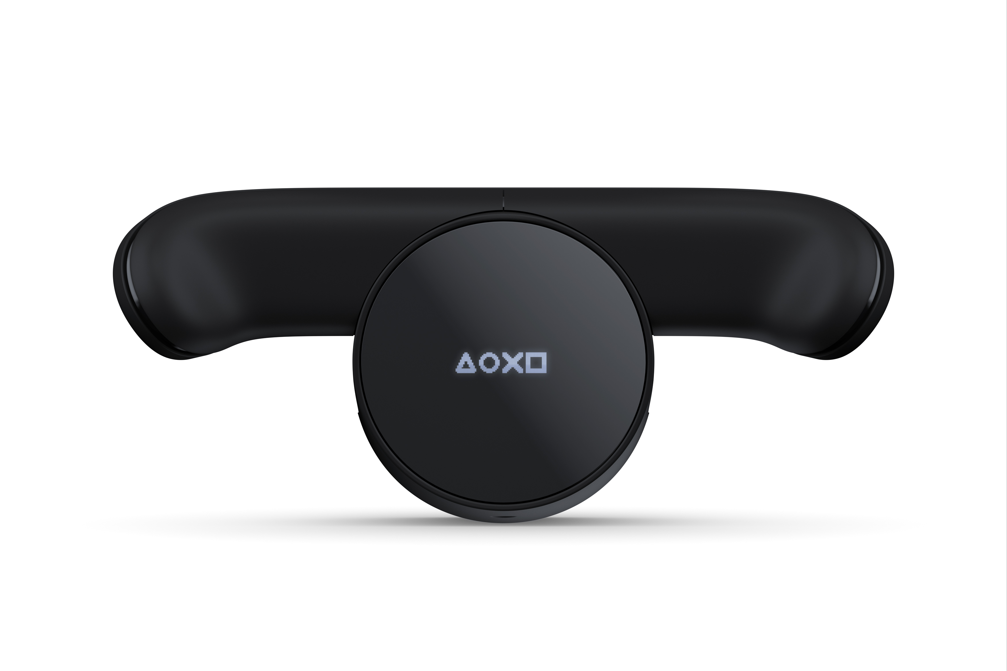 Ein schwarzer Gaming-Controller mit einem kreisförmigen Knopf. Der Controller befindet sich auf einer weißen Oberfläche.