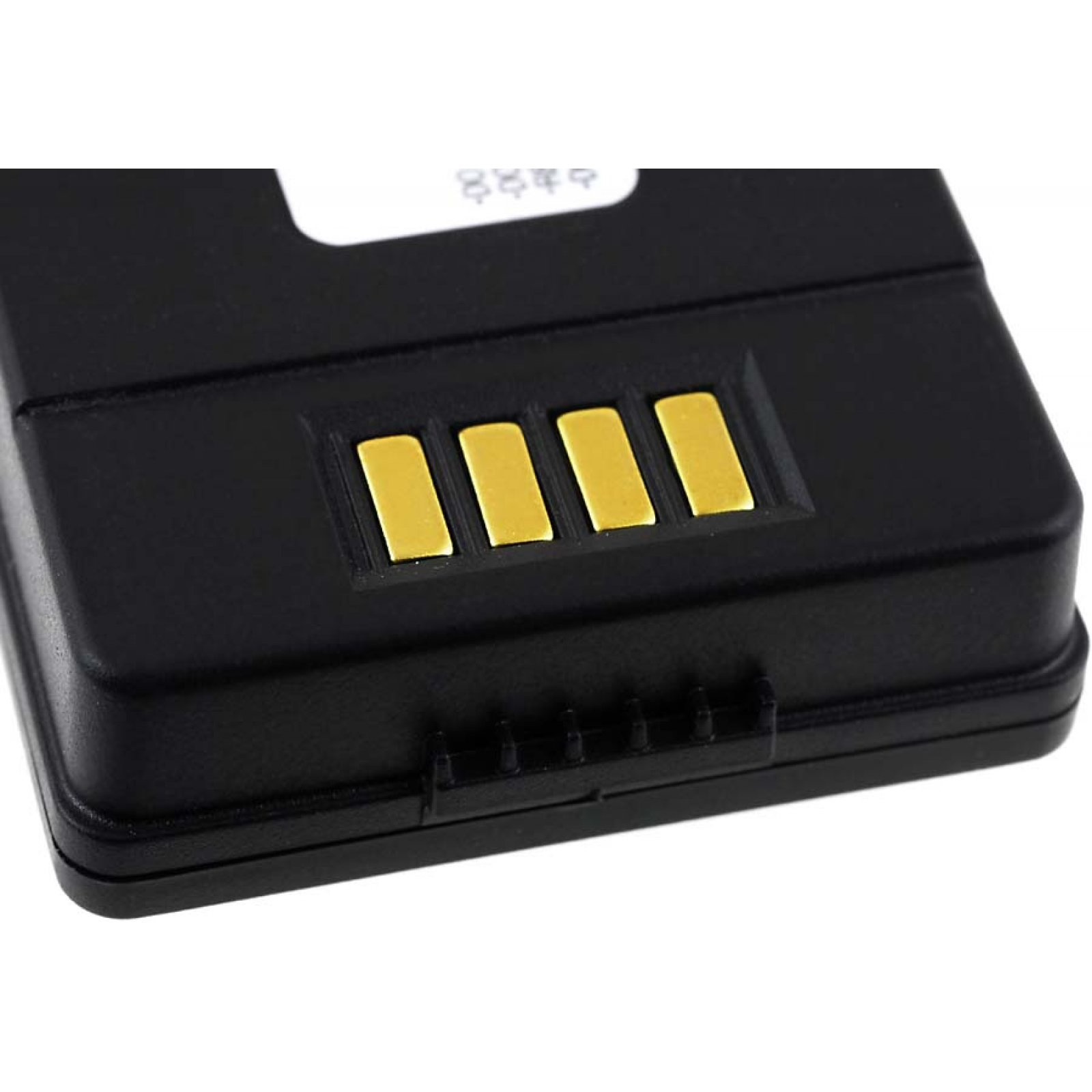 Un paquete de baterías rectangular negro con puntos de contacto dorados.