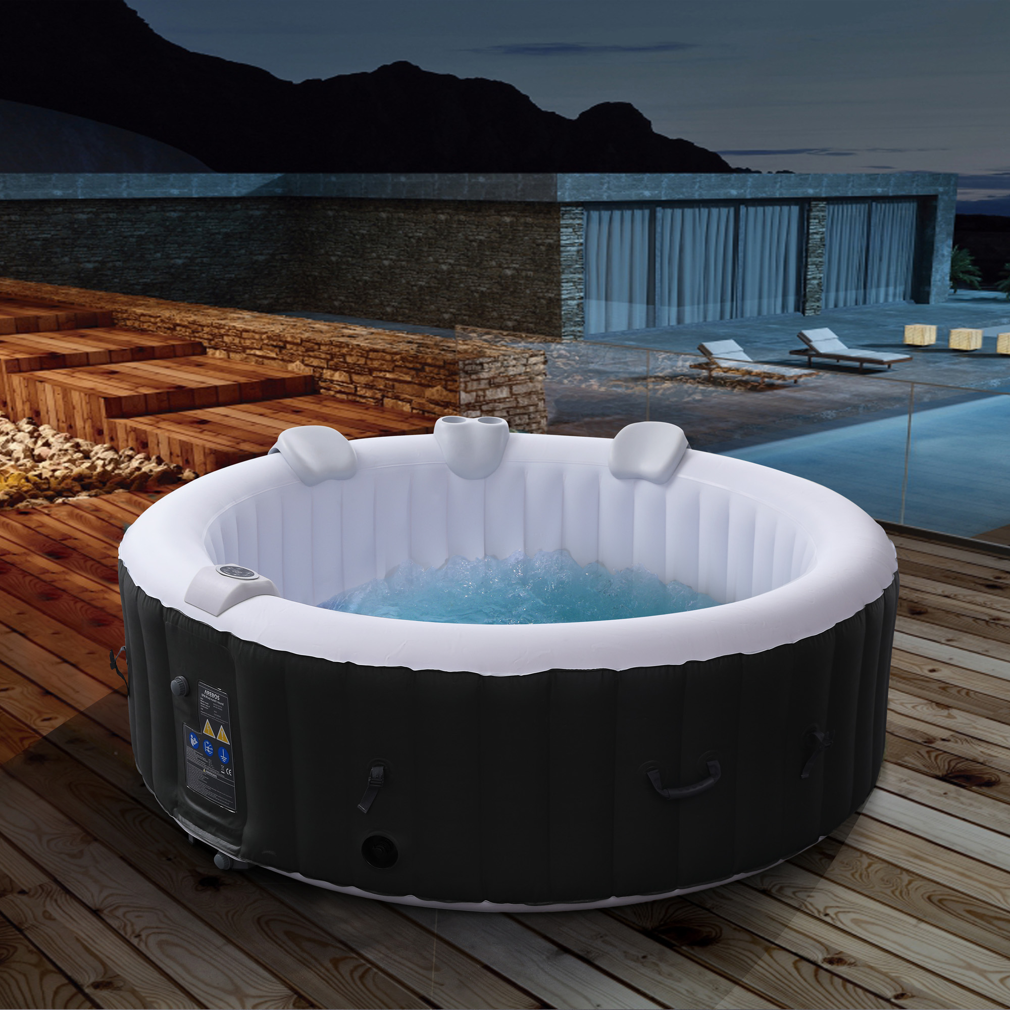 Aufblasbarer Whirlpool auf Holzterrasse, mit Nachtszene im Hintergrund.