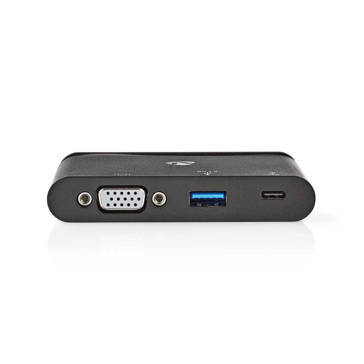 Schwarzer Hub mit VGA-, USB- und USB-C-Anschlüssen. Weißer Hintergrund. Der Hub liegt auf weißem Untergrund.