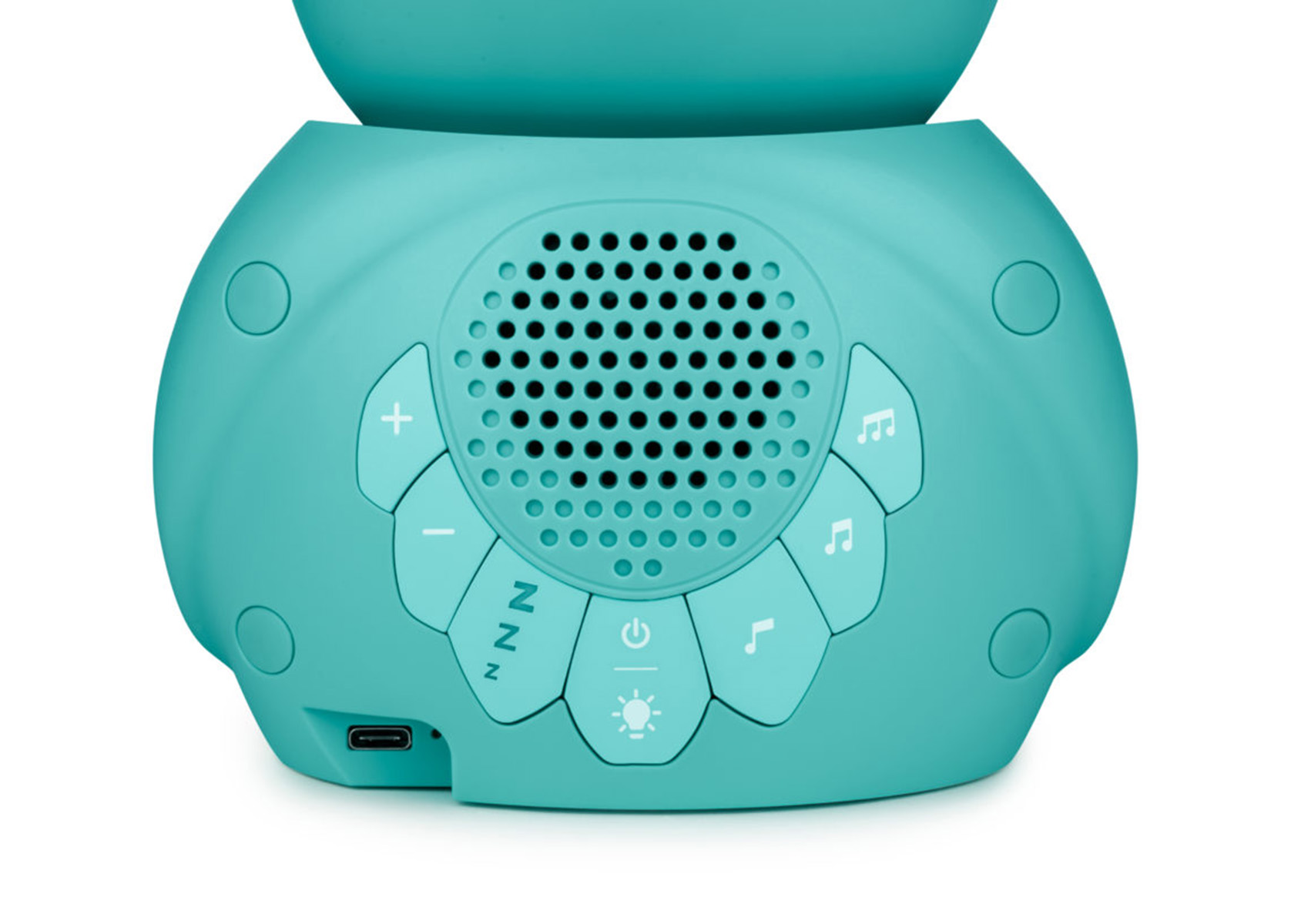 Altavoz color turquesa con botones: volumen, reposo y notas musicales. Un puerto de carga en la base.