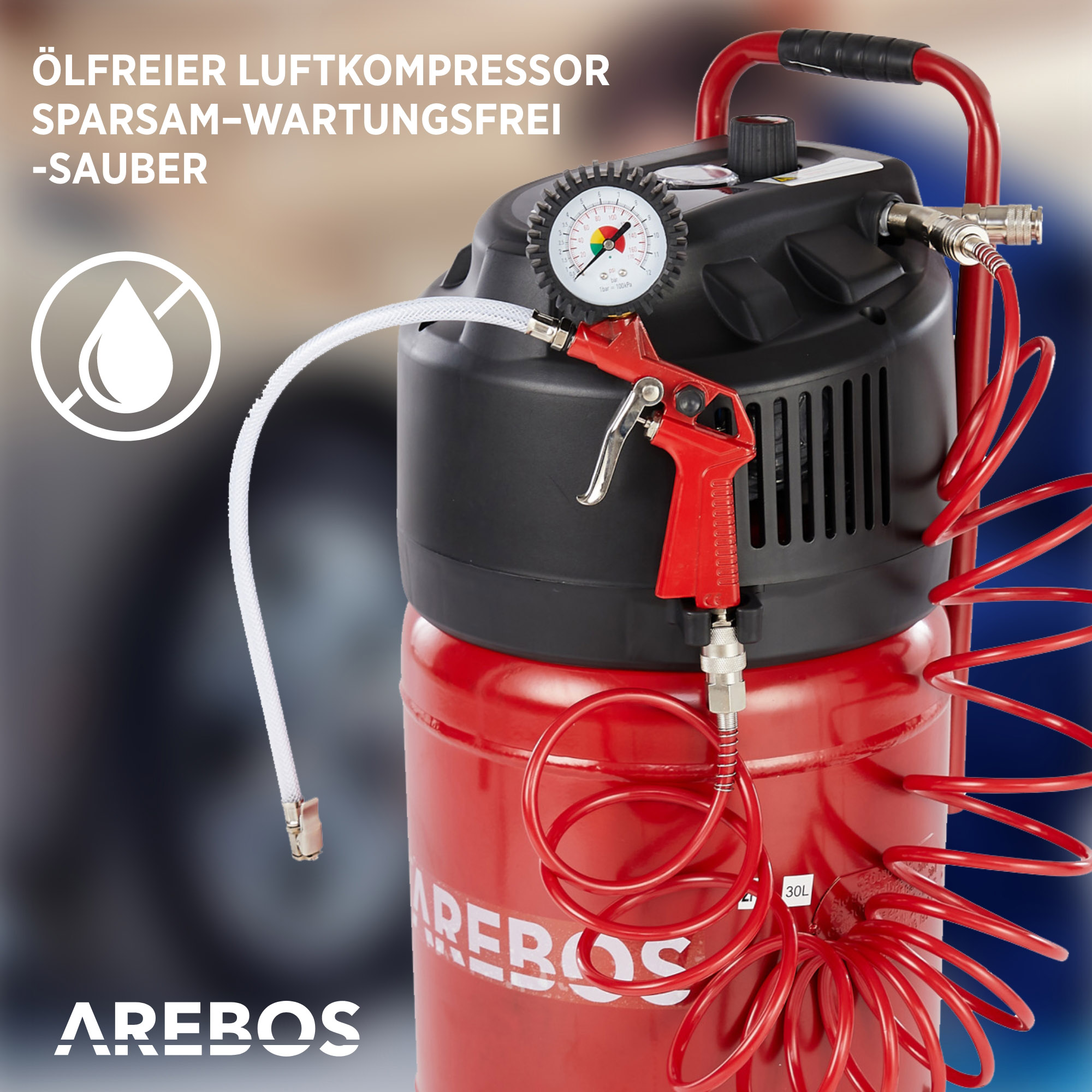 Roter Luftkompressor mit Manometer und roter Spritzpistole.