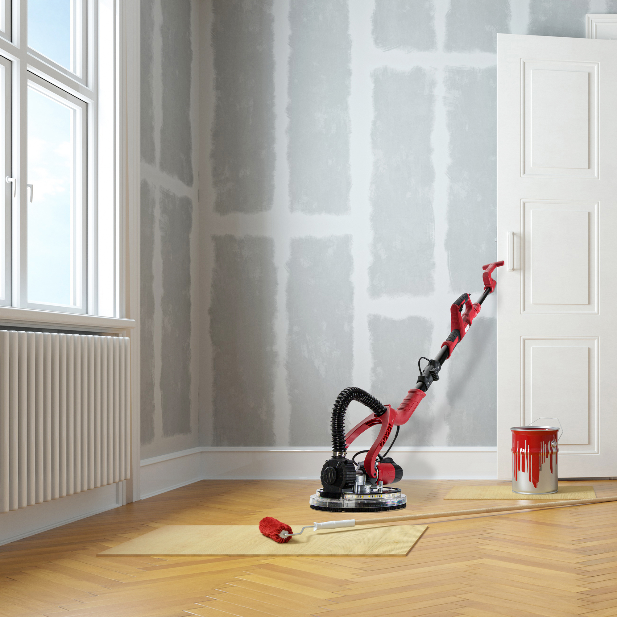 Innenraum mit teilbemalter Wand, Holzboden und Malwerkzeugen.