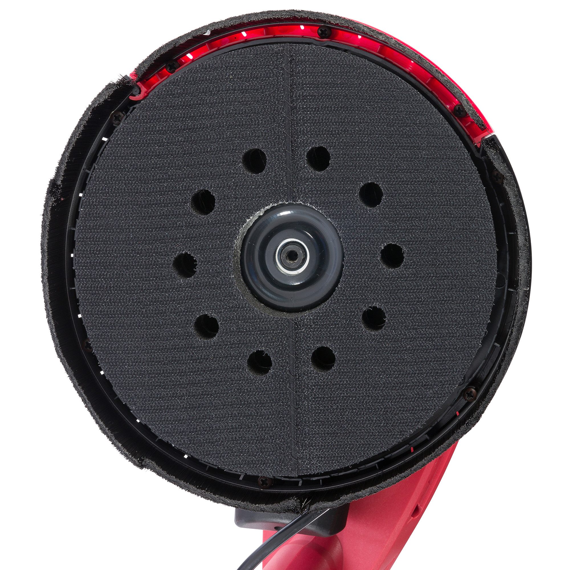 Roter Elektroschleifer mit schwarzem Schleifpad. Das Pad hat Löcher und wird von einem roten Rand umgeben.