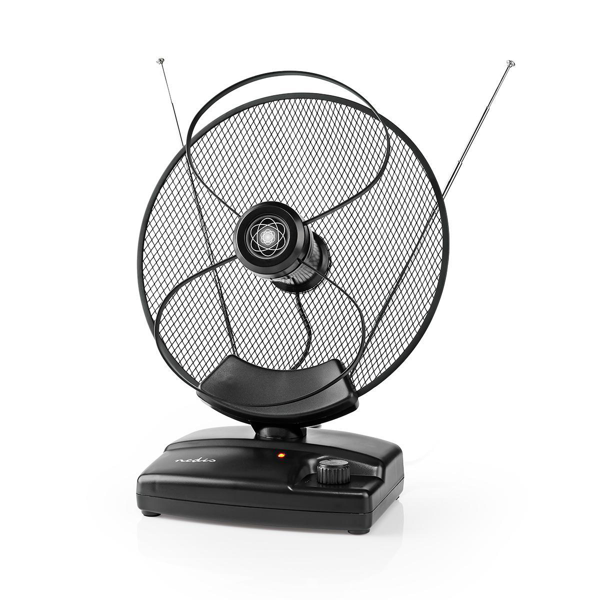 Eine schwarze Antenne mit zwei Stäben und einem Netz auf schwarzem Sockel, mit rotem Licht.