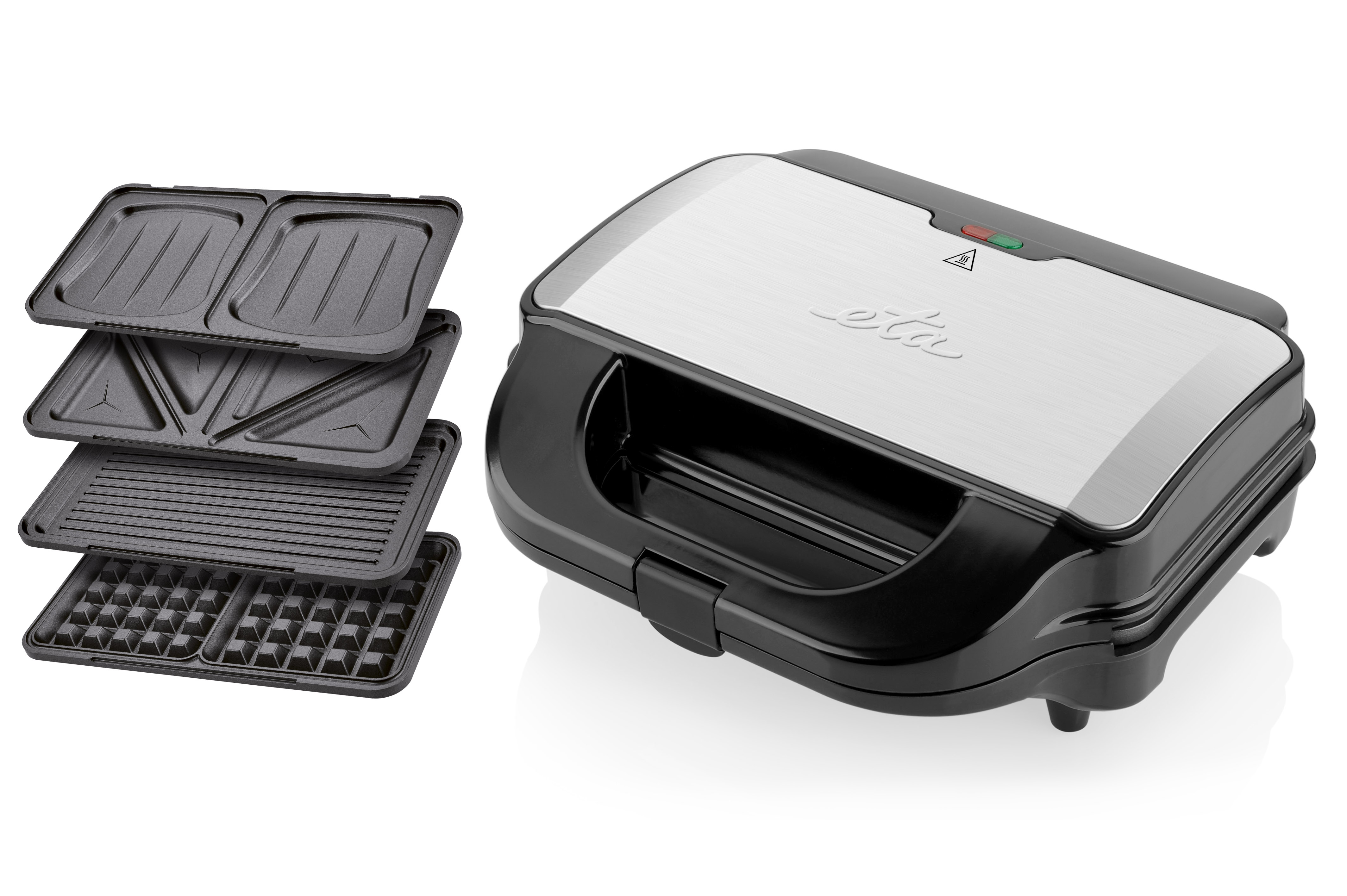 Czarny i srebrny opiekacz do kanapek. Ma różne płyty i jest na białym tle.