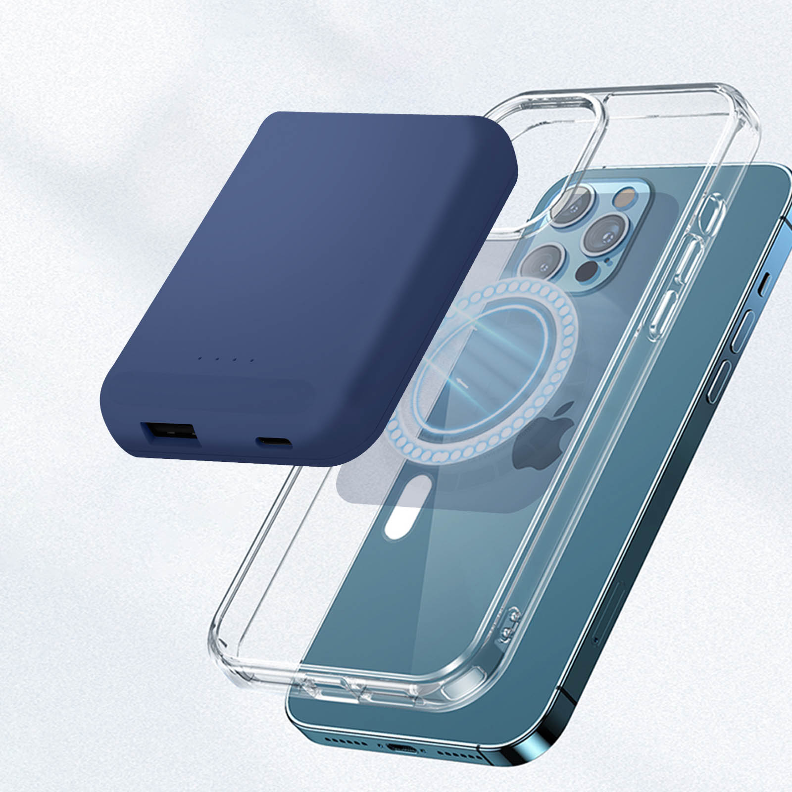 Eine blaue Powerbank und eine transparente Hülle liegen neben einem blauen Telefon.