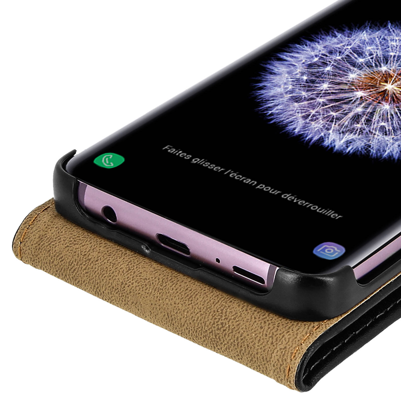 Un telefono in una custodia marrone viene mostrato con lo schermo acceso, mostrando un dente di leone. La custodia è aperta.