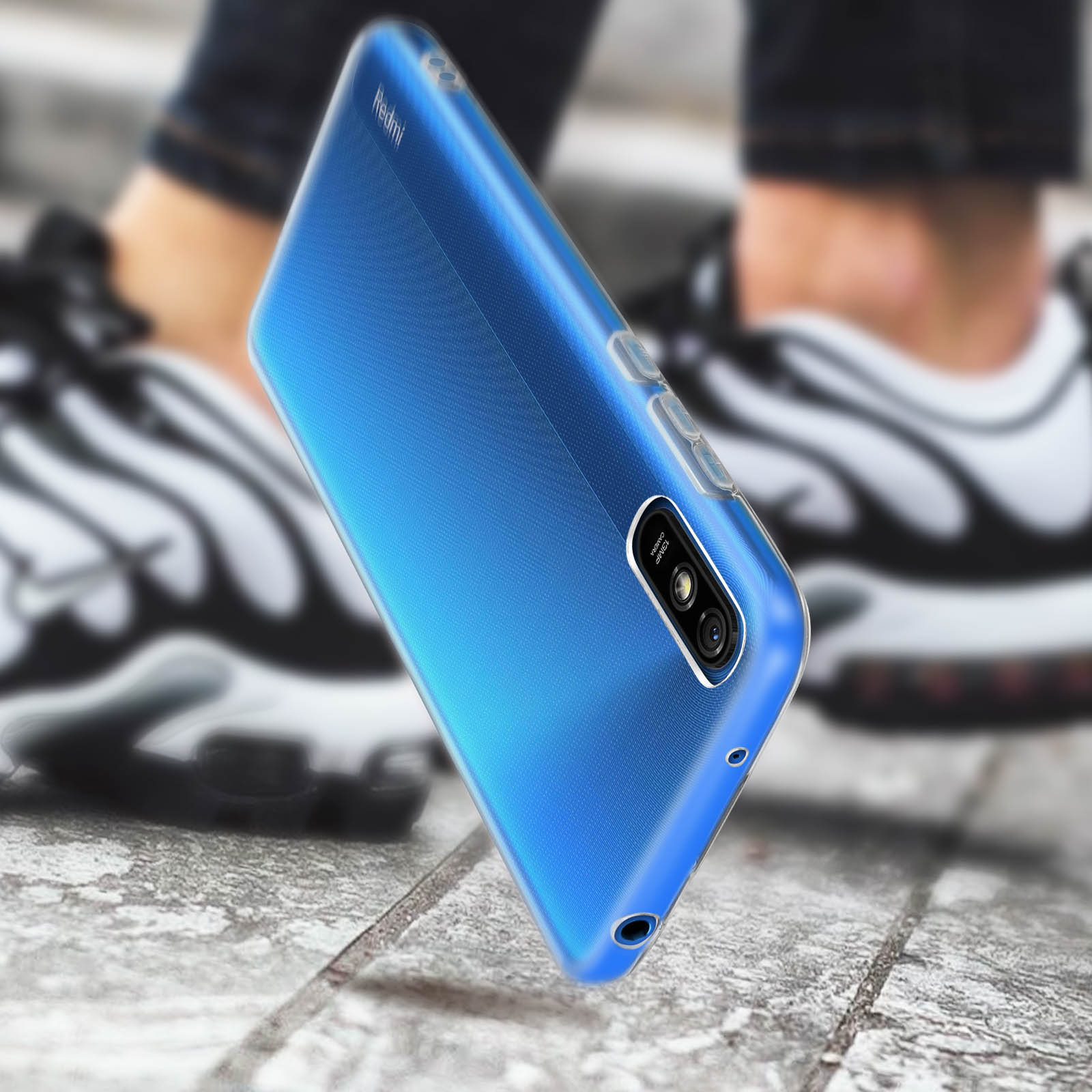 Blauwe telefoonhoes met een telefoon erin.