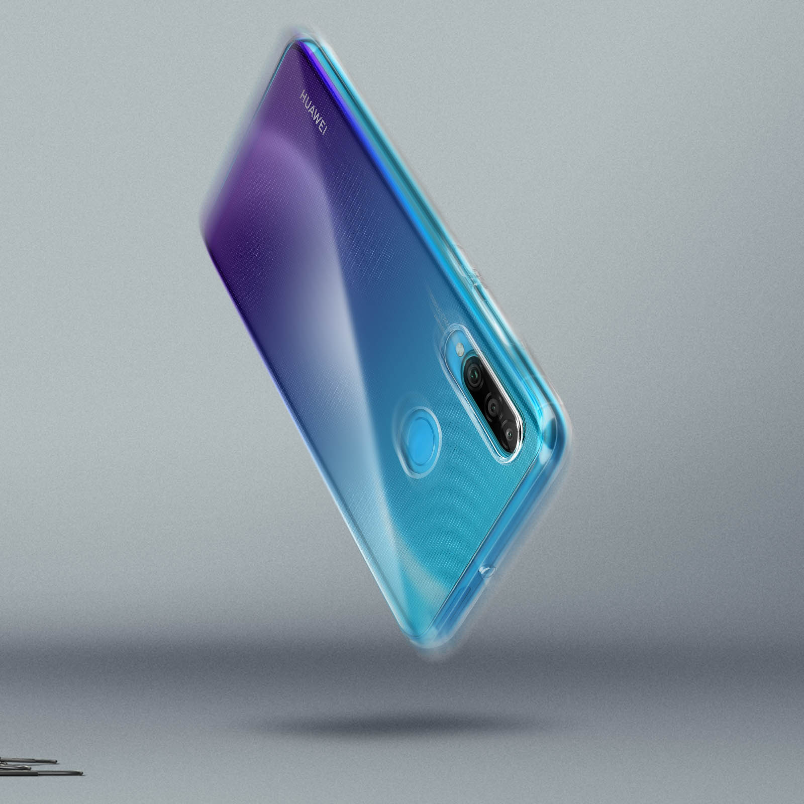 Un téléphone dans un étui transparent est en l'air.