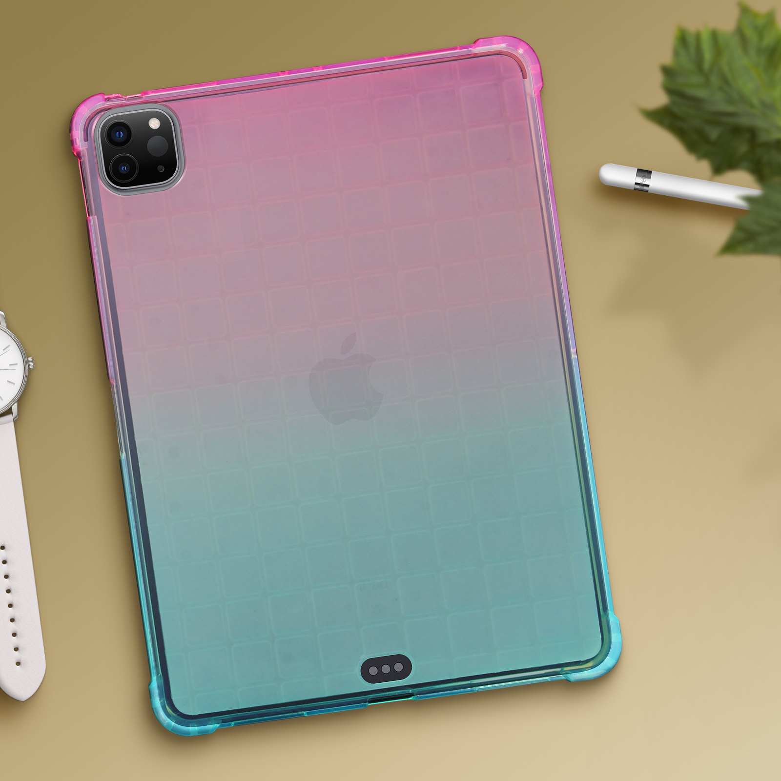 Tablet in einer Hülle mit farbenfrohem Design. Pink zu blauem Farbverlauf. Die Hülle liegt auf goldener Oberfläche.
