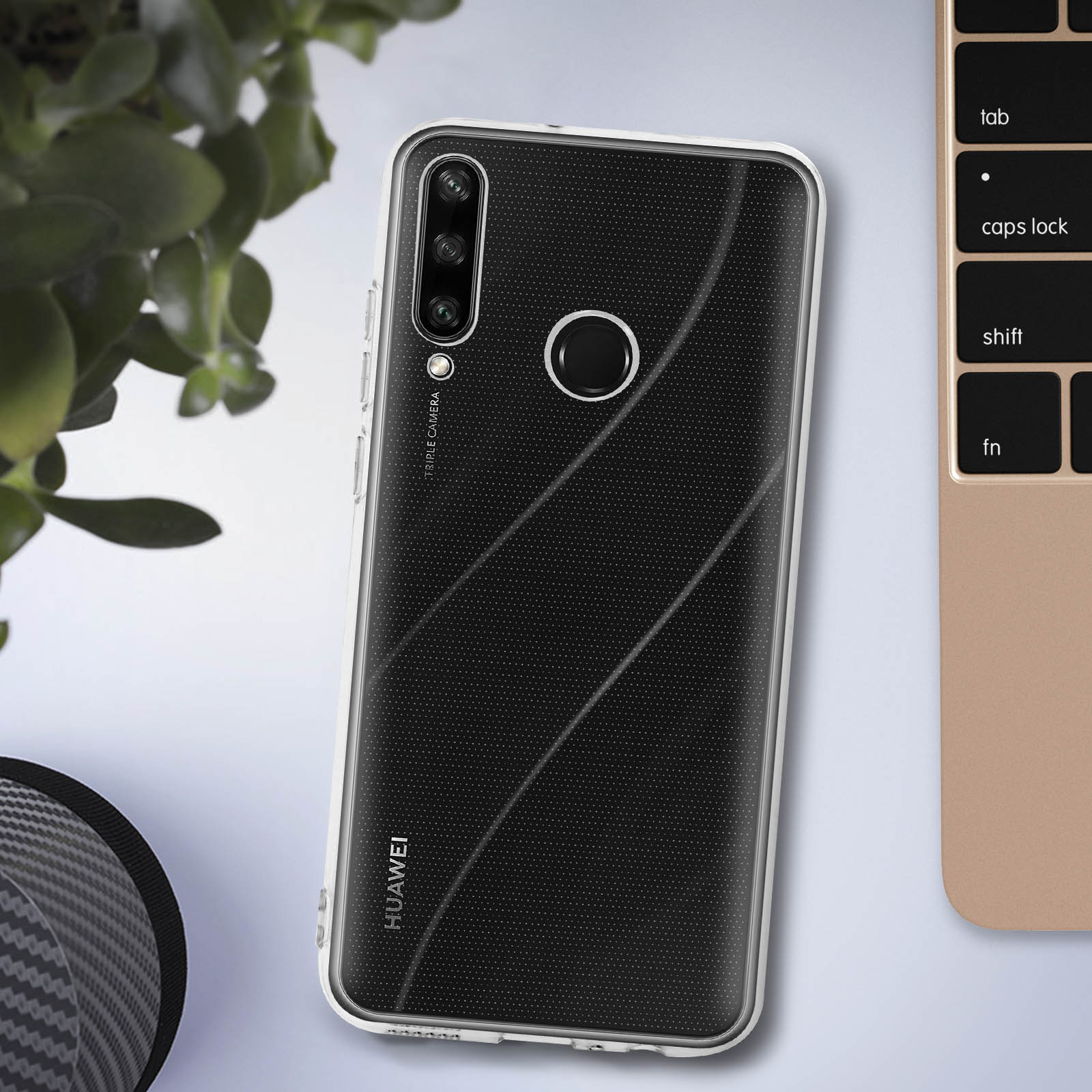 Handyhülle auf einem Schreibtisch mit schwarz-weißem Design, die die Kamera zeigt.