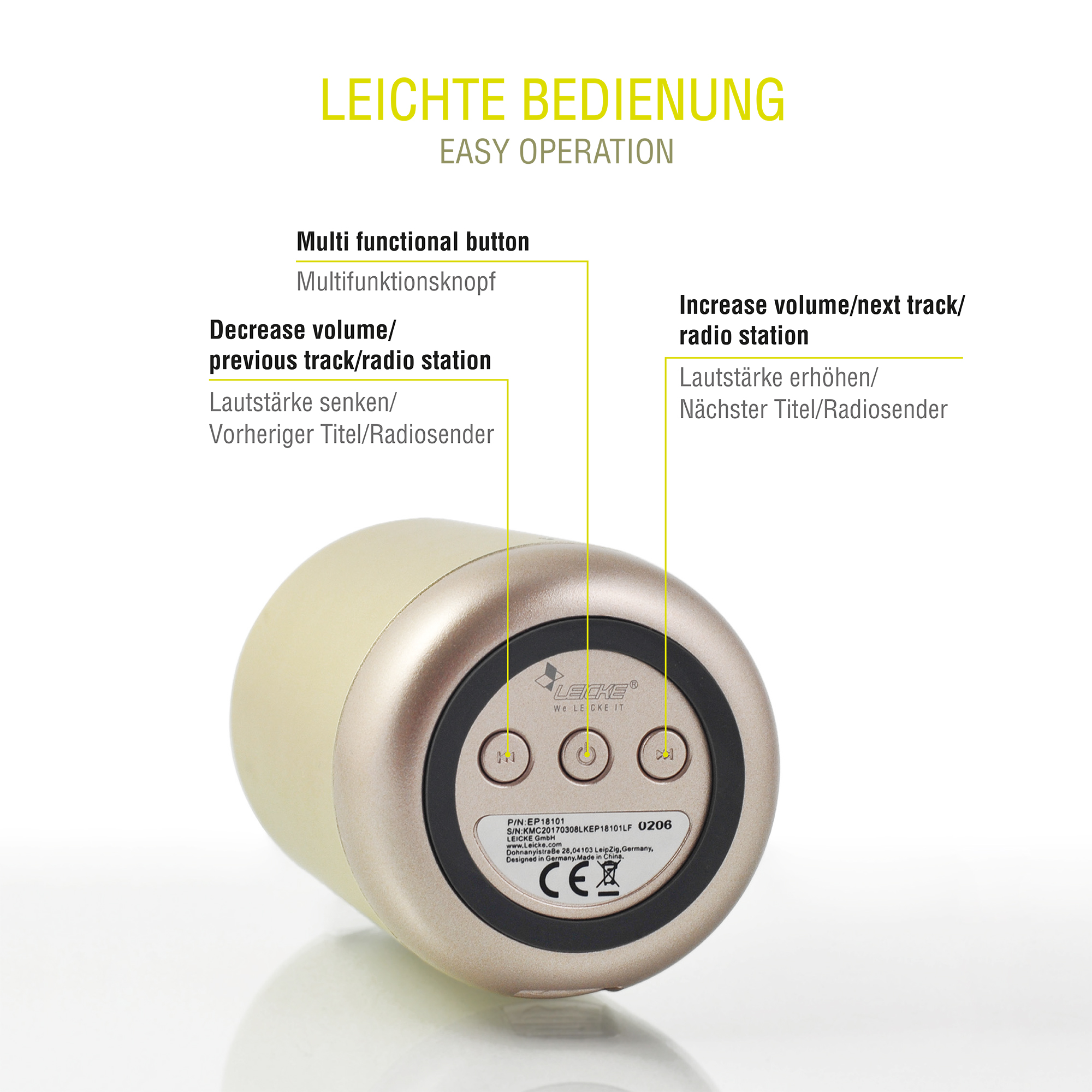 Nahaufnahme eines beigen Lautsprechers mit beschrifteten Knöpfen und Text.