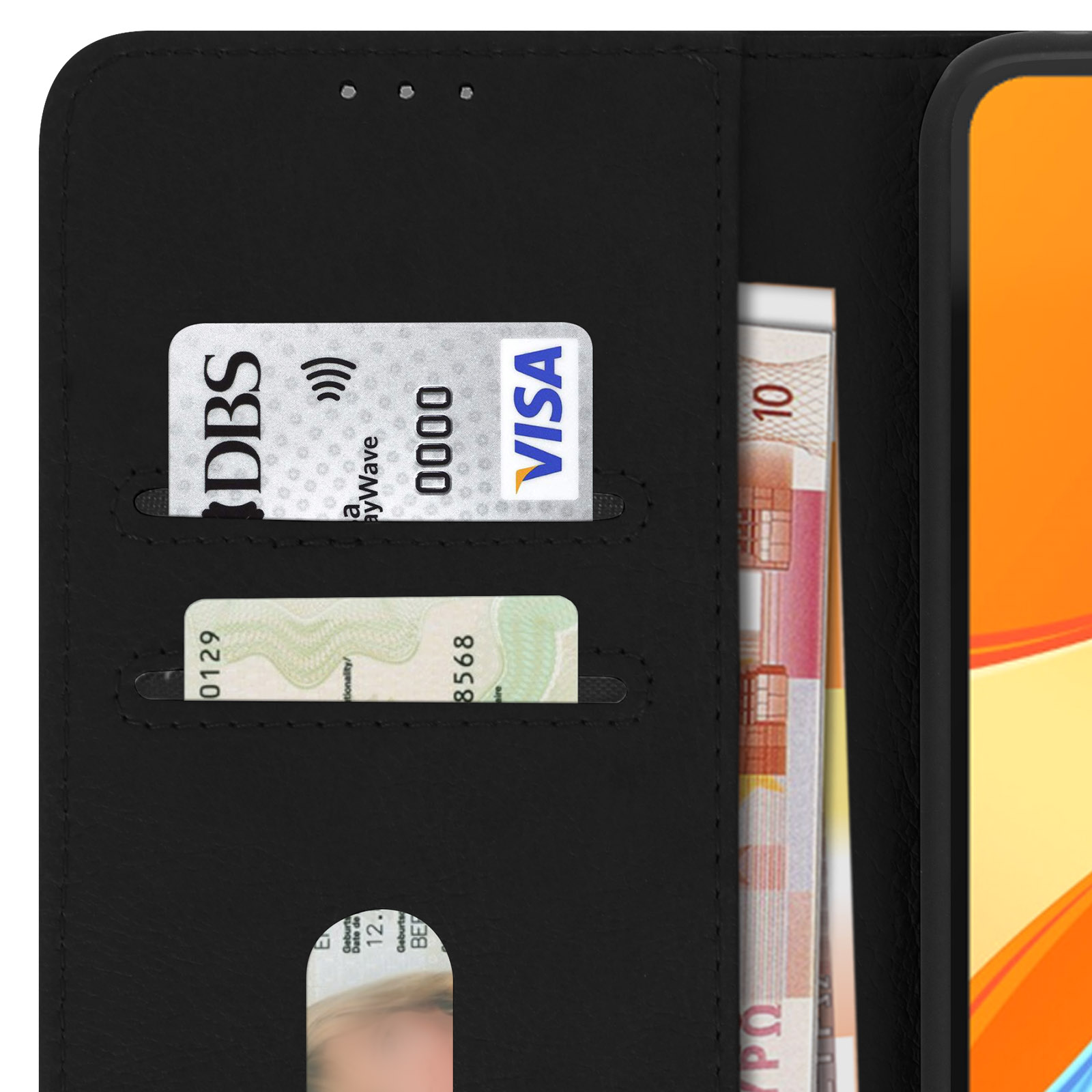 Zwarte telefoonportemonnee met creditcards en contant geld erin. Close-up.