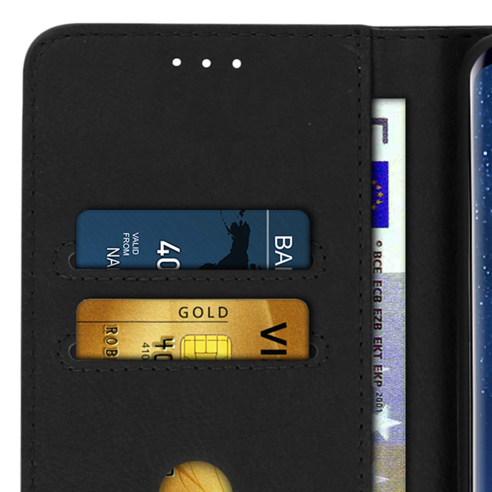 Close-up van een portemonnee-hoes met creditcards en biljetten.
