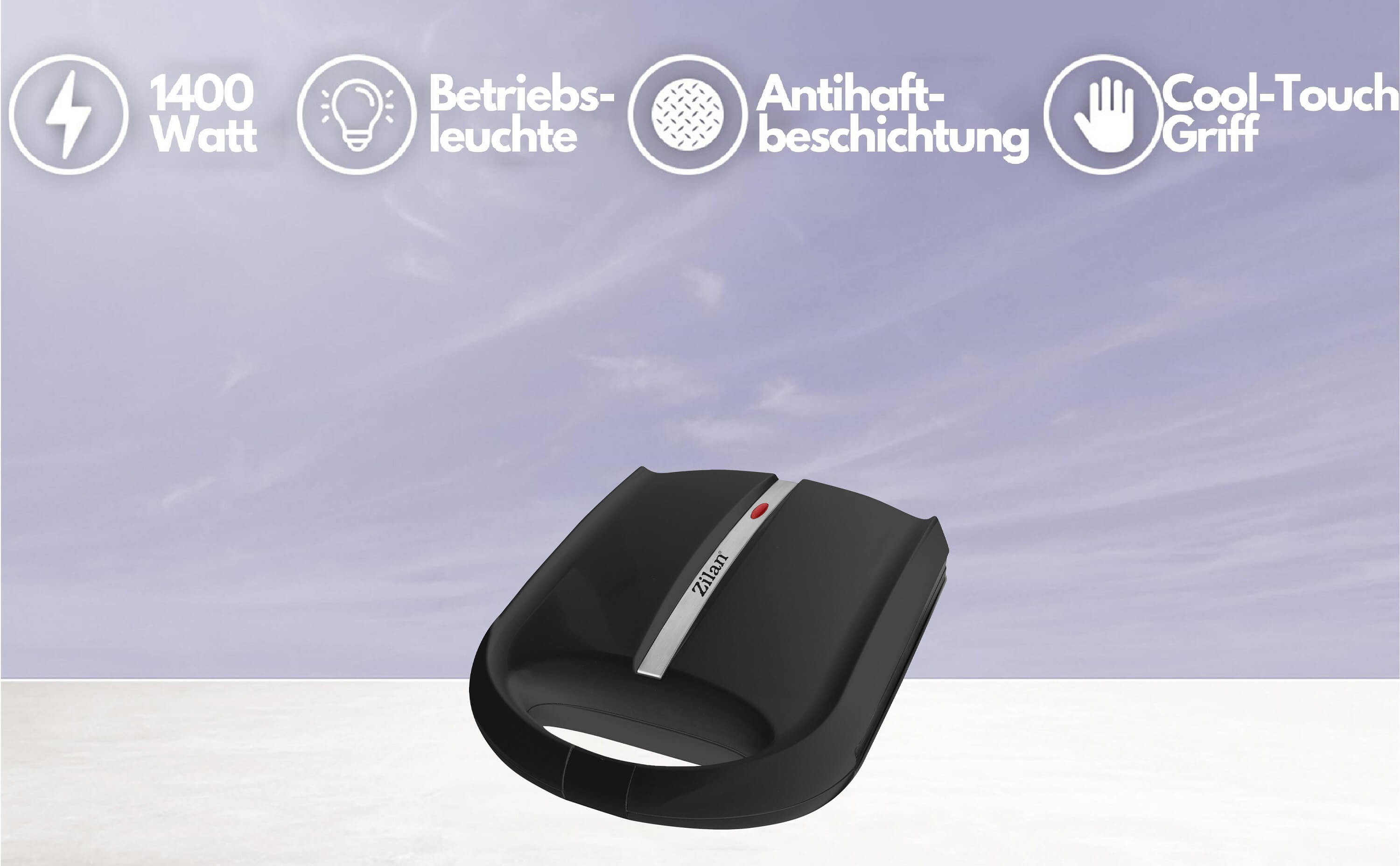 Laptop jest otwarty, pokazując klawiaturę. Widok z góry urządzenia ukazuje klawiaturę i ekran.