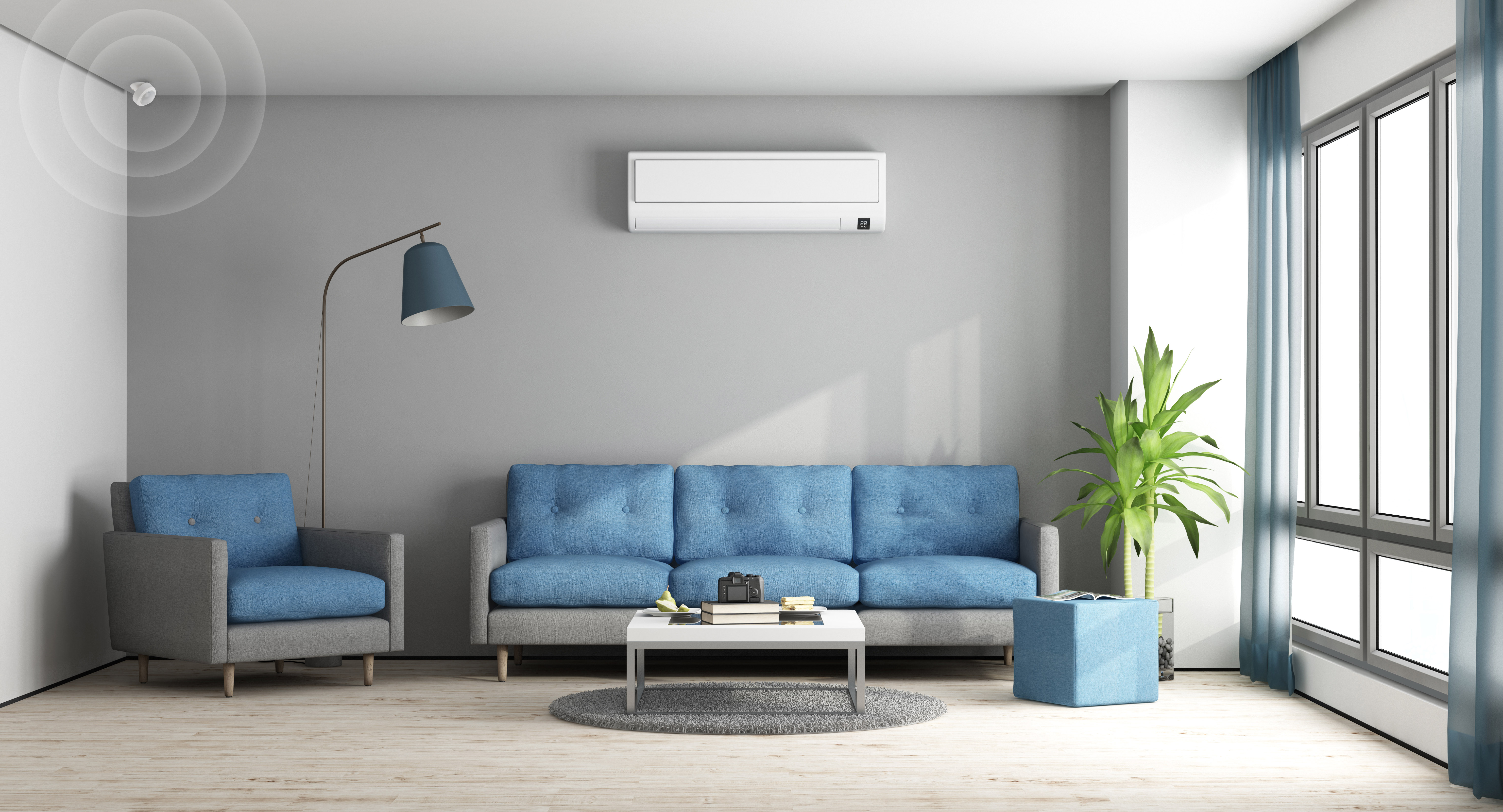 Modernes Wohnzimmer mit blauem Sofa, Sessel und Couchtisch. Klimaanlage und Lampe vorhanden.