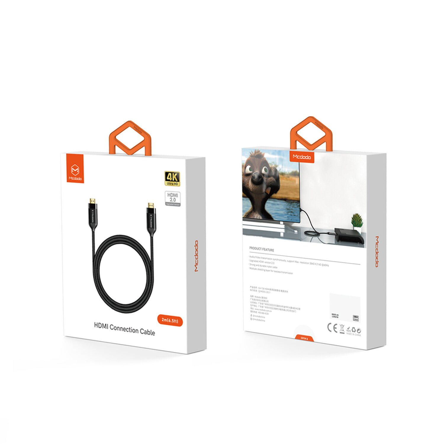 Wei ße Schachtel mit HDMI-Kabel und Cartoon auf der Rückseite.