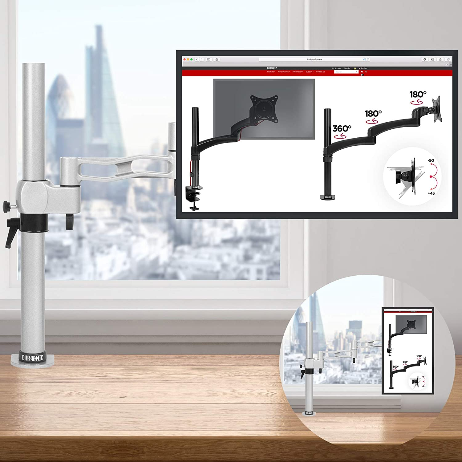 Brazo de monitor con un monitor que muestra un sitio web, contra una ventana con vistas de la ciudad.