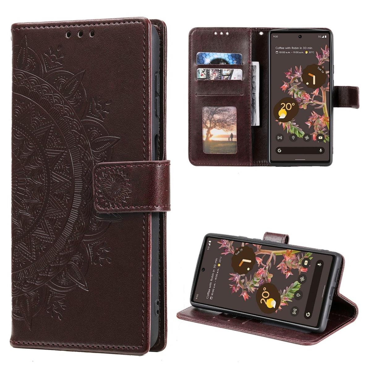 Braune Handyhülle mit Blumendesign, offen und geschlossen, mit Telefon innen.