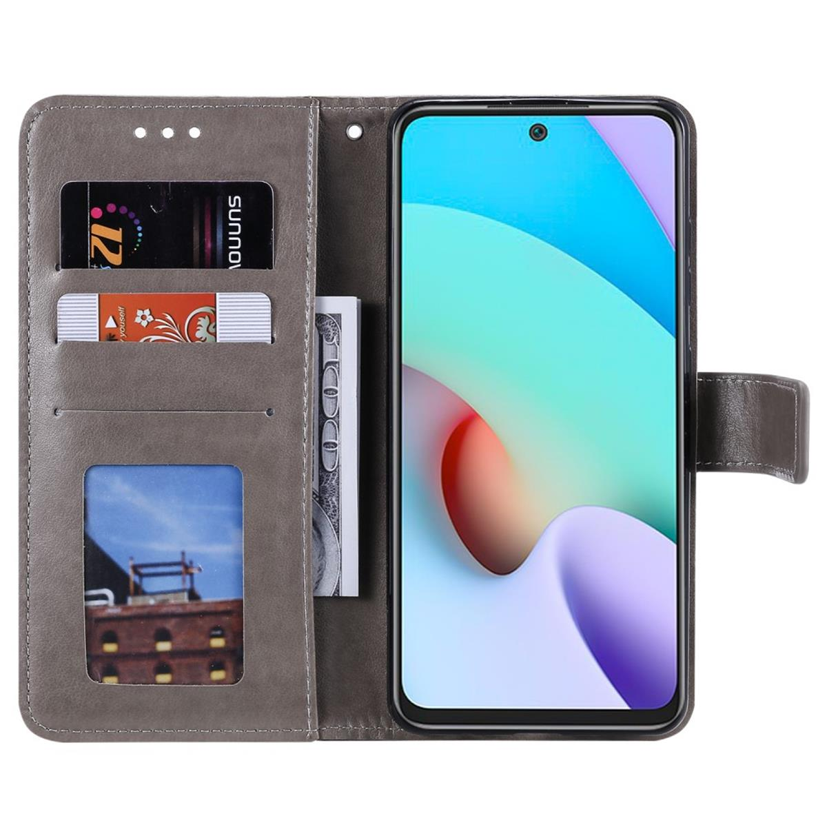 Graue Handyhülle offen, hält ein Telefon mit einem lila Orb auf dem Bildschirm.