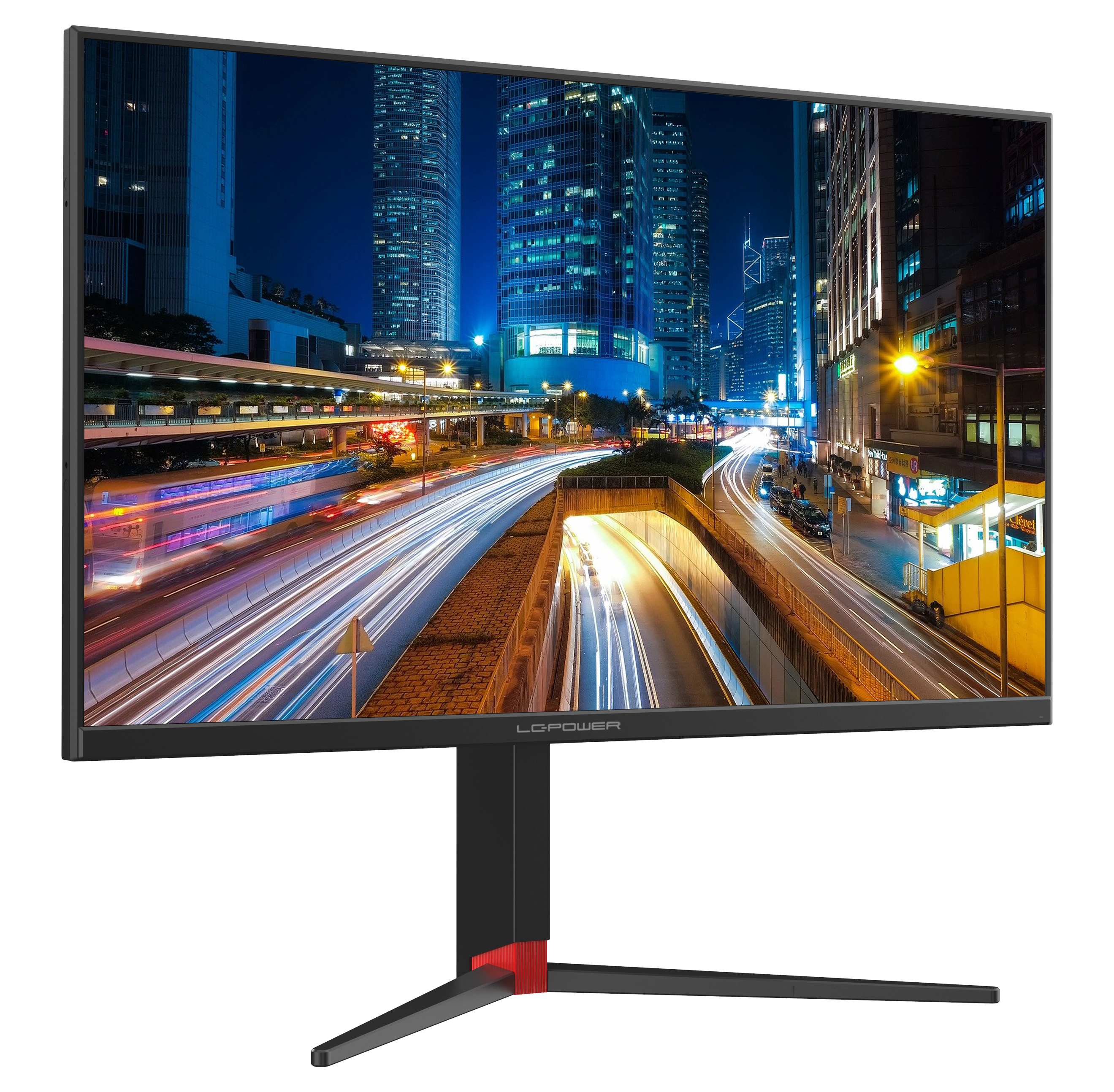 Ein großer Computermonitor, der eine Stadtlandschaft bei Nacht zeigt.