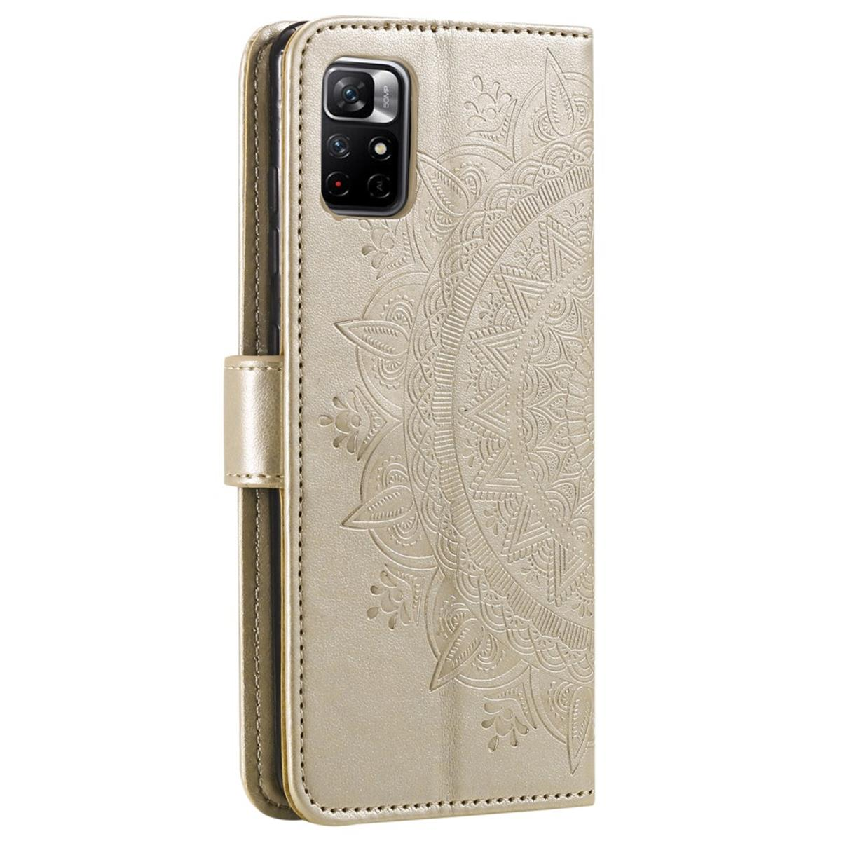 Goldenes Handycase mit Mandalamuster, aufrecht stehend.