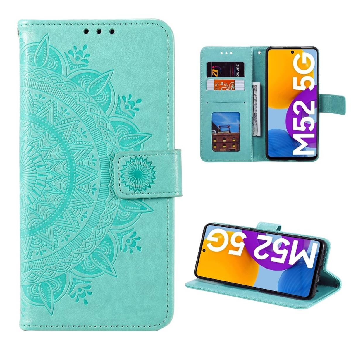 Türkisfarbene Handyhülle mit Mandala-Design, die ein Telefon mit sichtbarem Bildschirm hält.