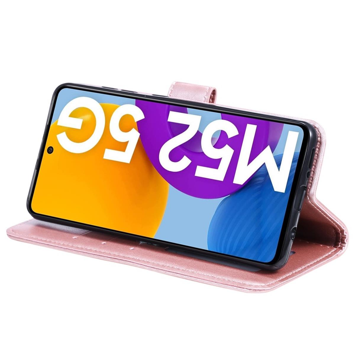 Rosa Handyhülle mit einem Telefon, das M52 5G auf dem Bildschirm anzeigt. Die Hülle ist offen.
