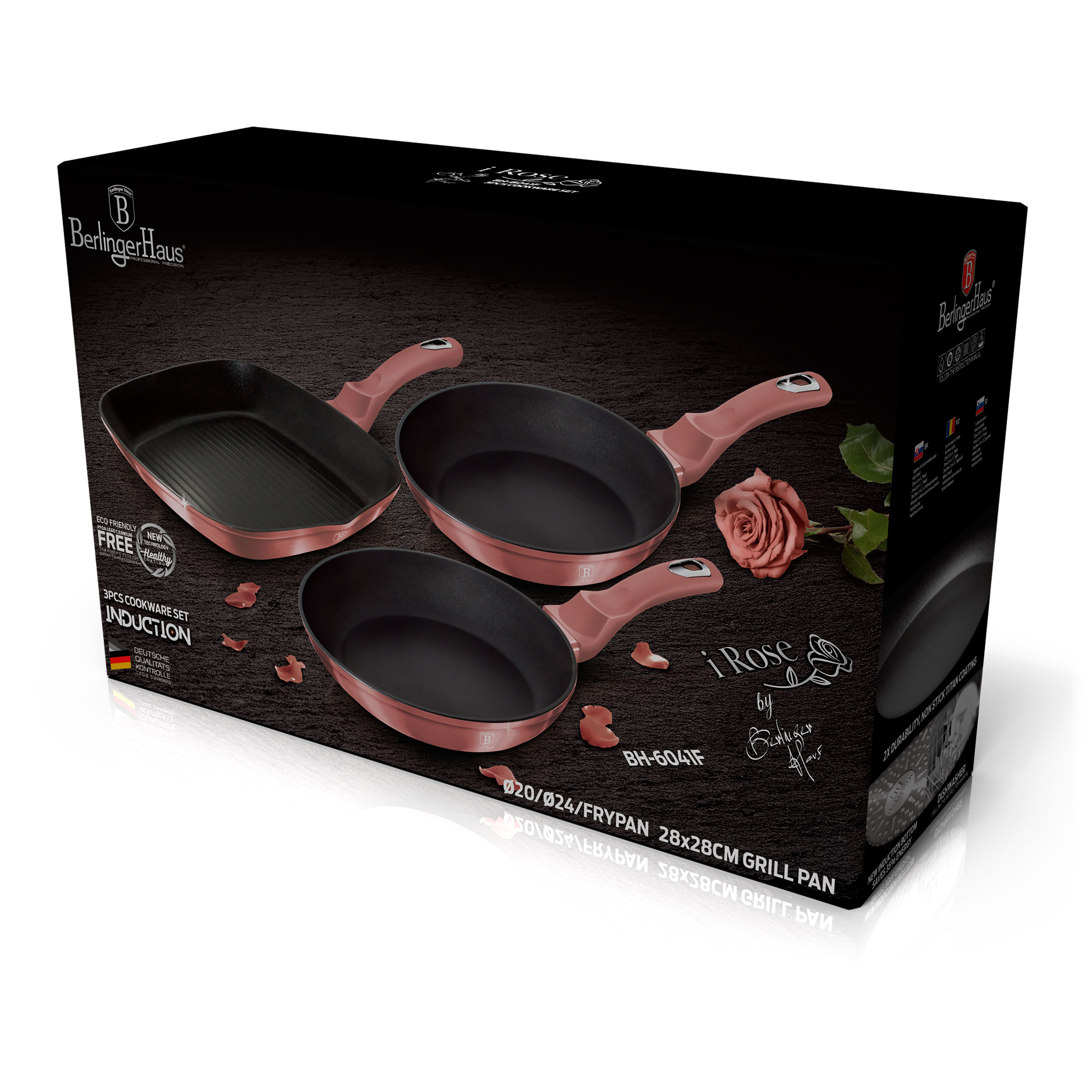Juego de utensilios de cocina rosa en caja negra. Sartenes y rosa visibles, con texto en embalaje.