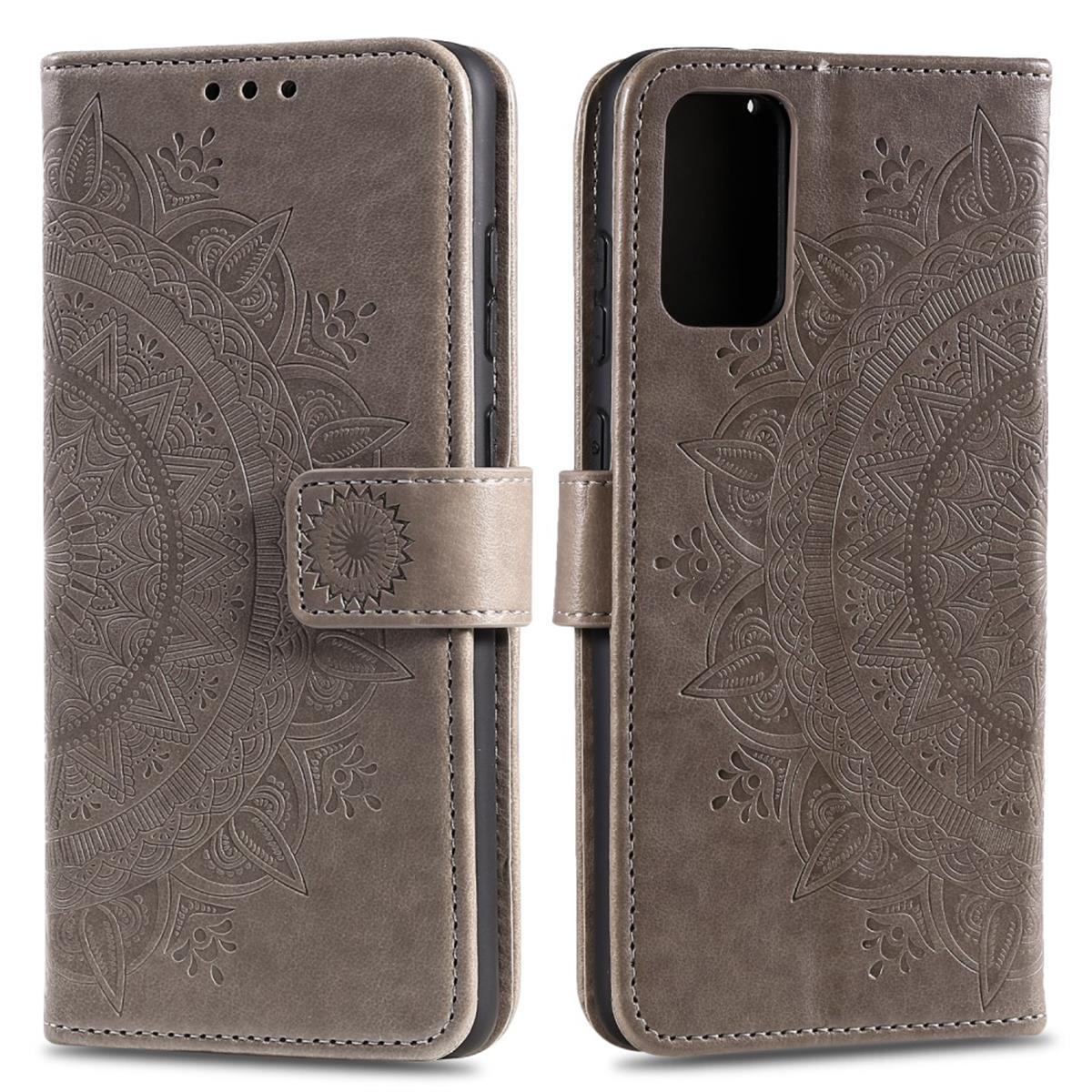 Eine graue Leder-Handyhülle mit Mandala-Design und Magnetverschluss.