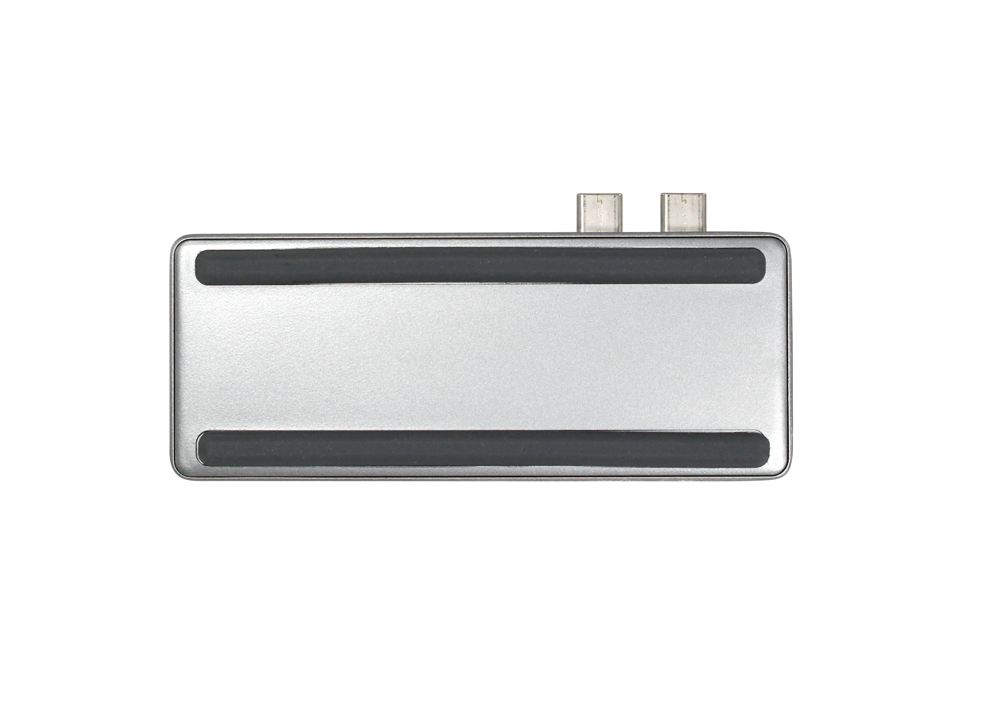 Silbernes rechteckiges Gerät mit zwei USB-C-Anschlüssen. Schwarze Gummi-Griffe oben und unten. Weißer Hintergrund.